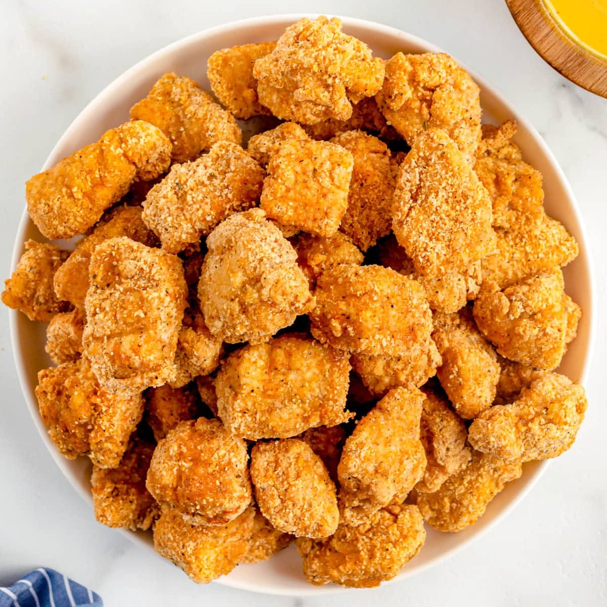 Order Chicken Nuggets - 7 Pieces food online from Positanos Pizza store, Chicago on bringmethat.com