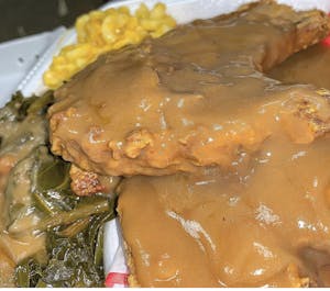 Order Smothered Pork Chops food online from Soul Tasty store, Stamford on bringmethat.com