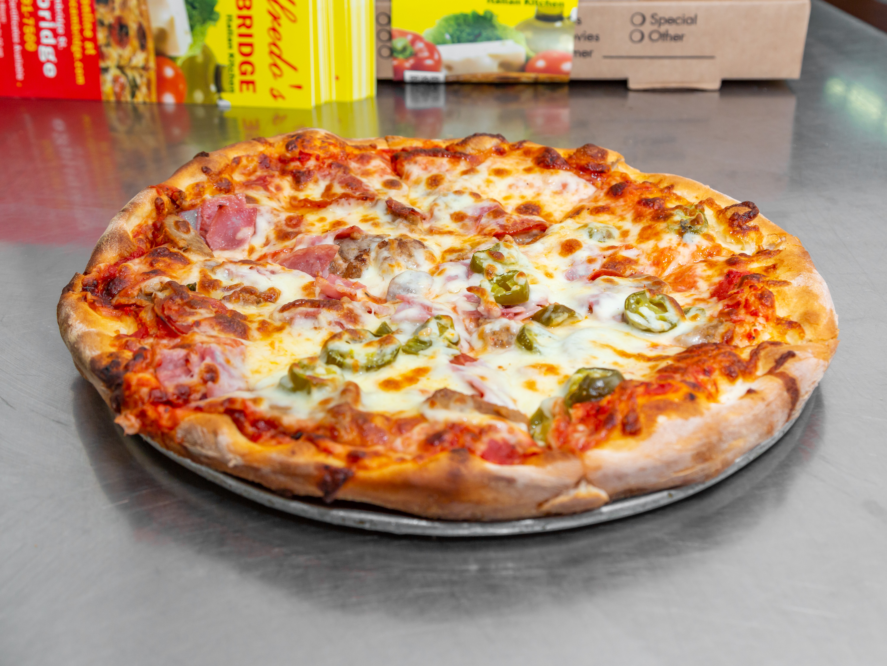 Order Meat Lover's Pizza food online from Alfredo's Italian Kitchen store, Cambridge on bringmethat.com