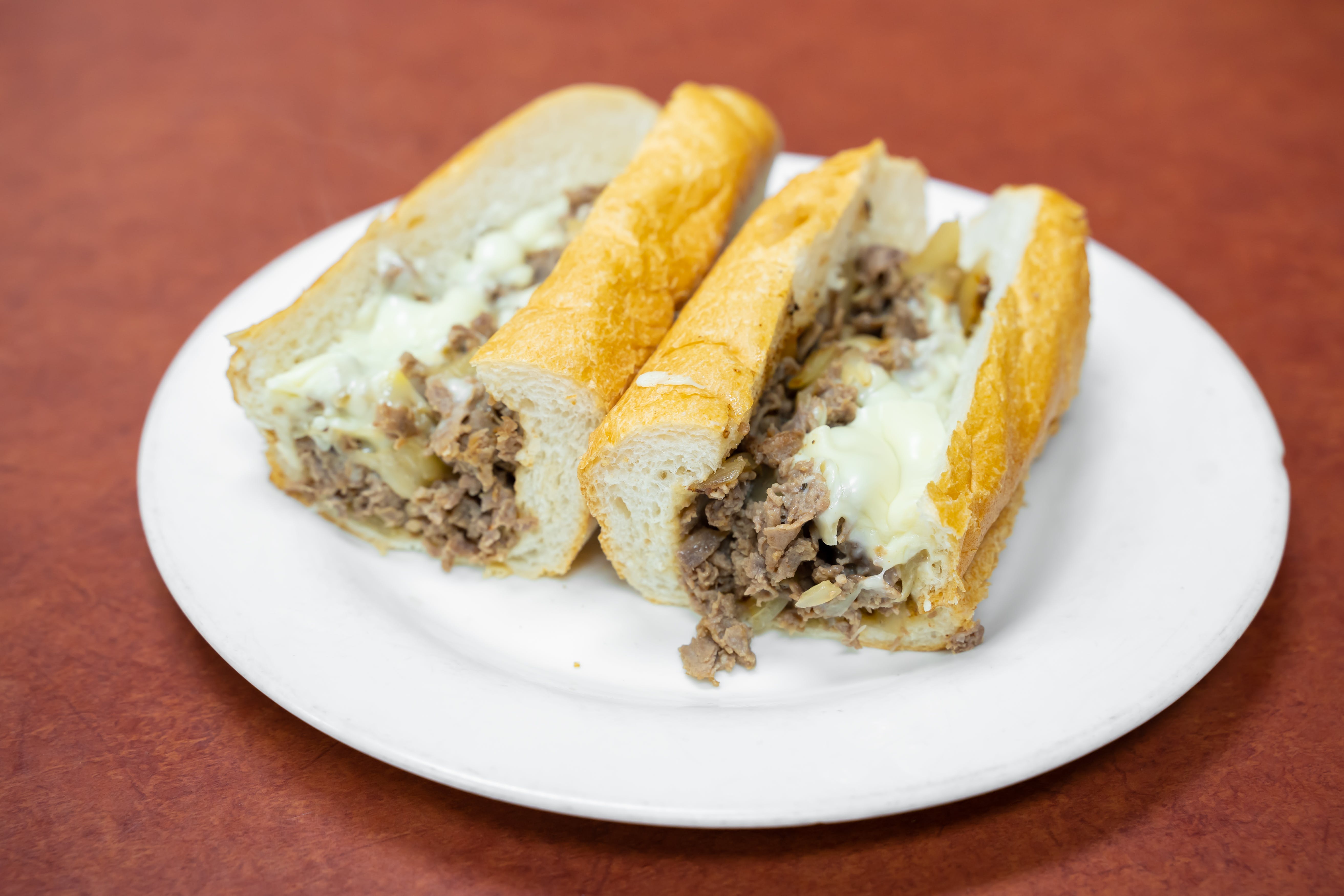 Order Cheesesteak Sub - Small food online from Tony Sopranos Pizza store, Cherry Hill on bringmethat.com