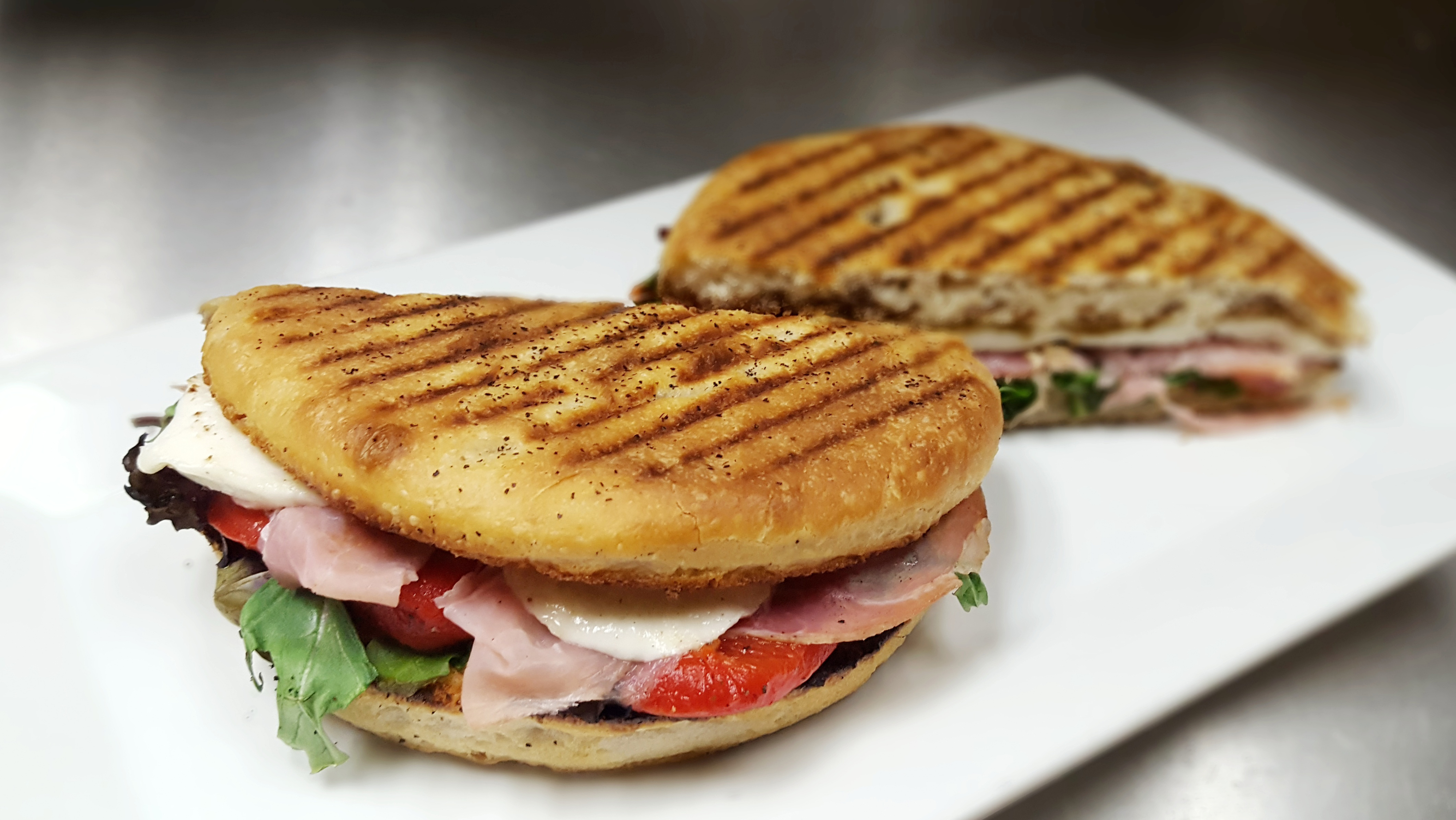 Order Prosciutto di Parma Panini food online from Marios Pizza Center & Restaurant store, Middlesex on bringmethat.com
