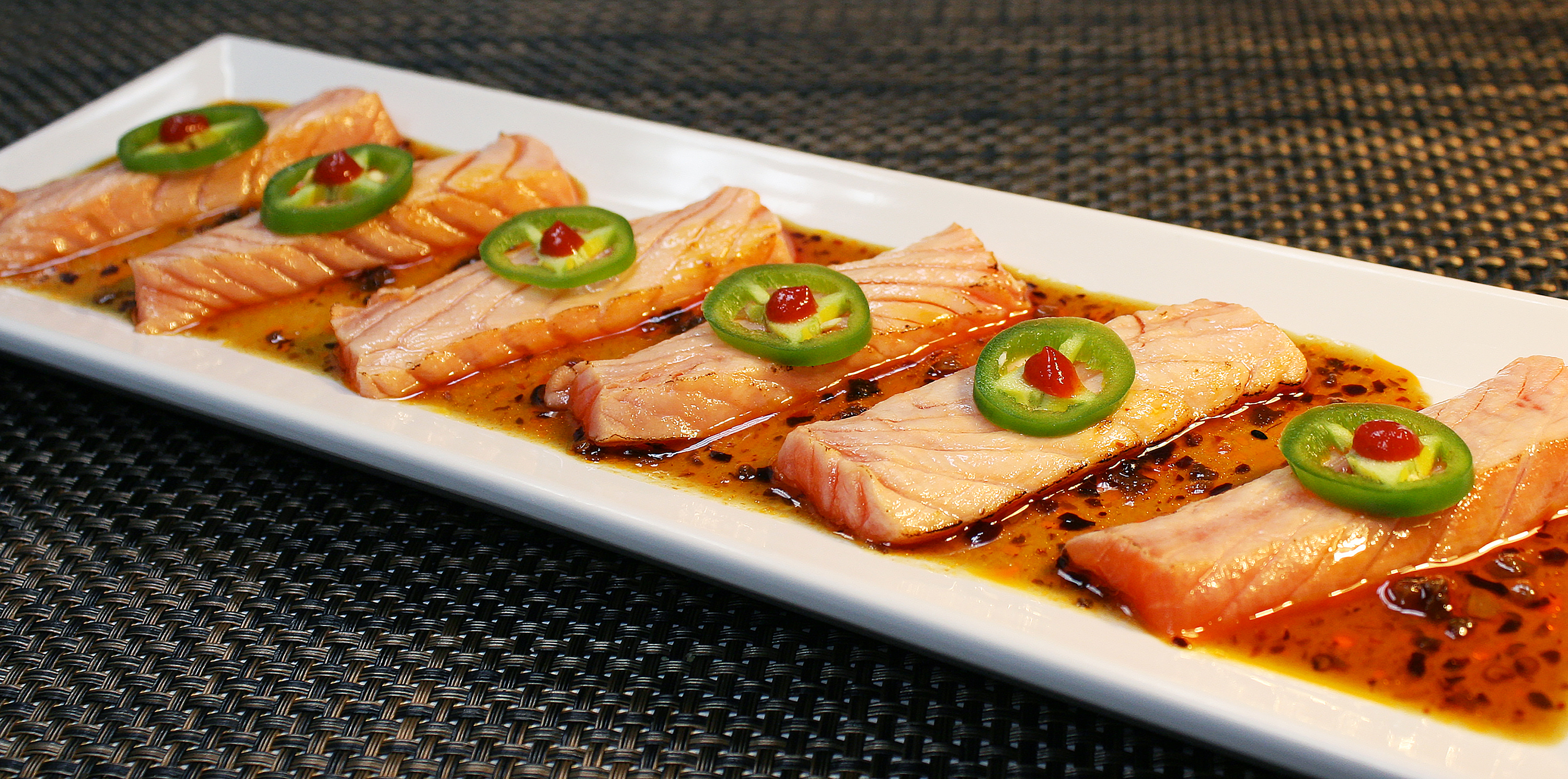 Order Spicy Seared Salmon Tataki Special food online from Oki Doki Roll & Sushi store, Brea on bringmethat.com