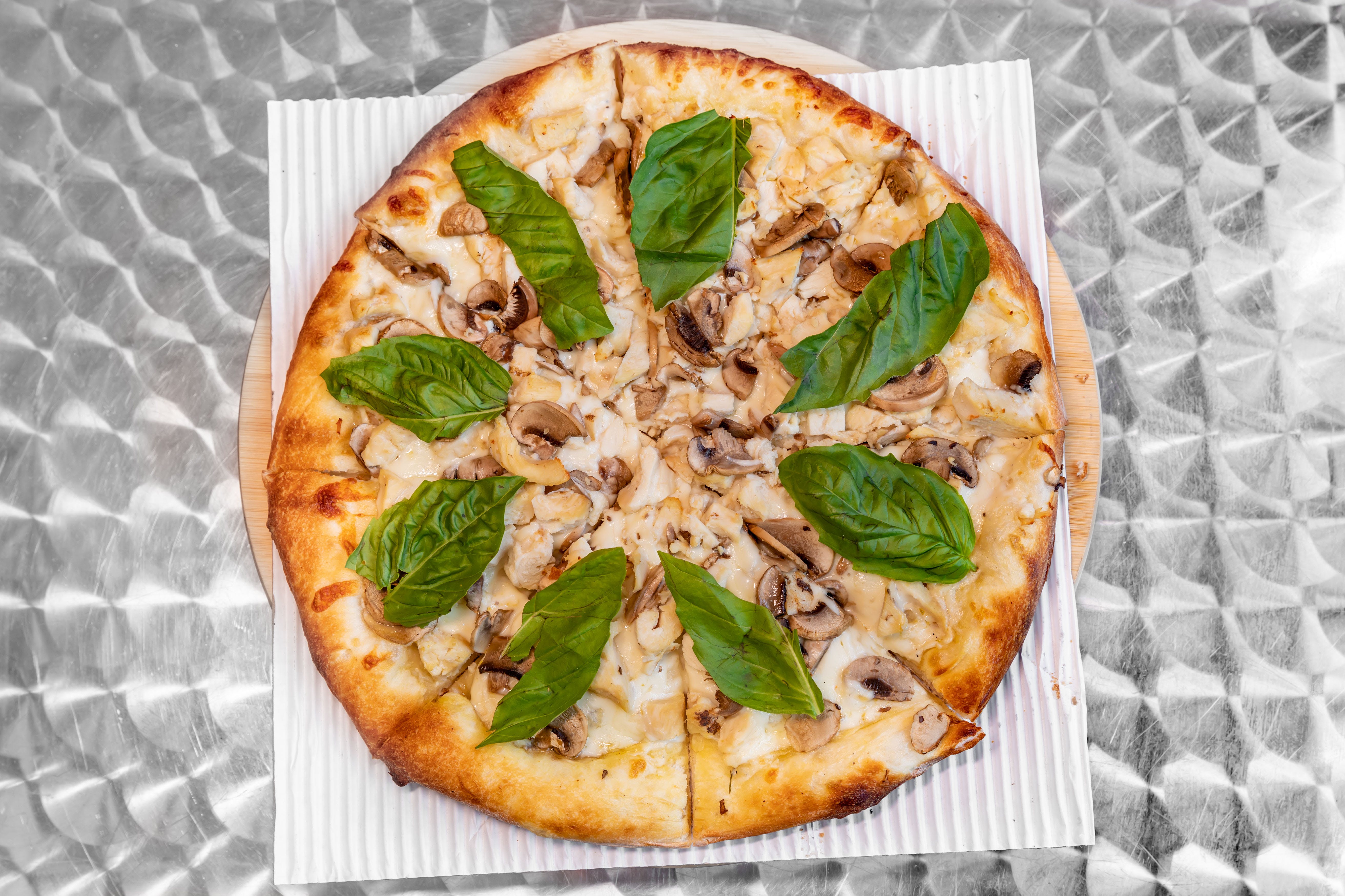 Order Chicken Alfredo & Mushroom Pizza - Medium 12" food online from Promenade Pizza store, Anaheim on bringmethat.com