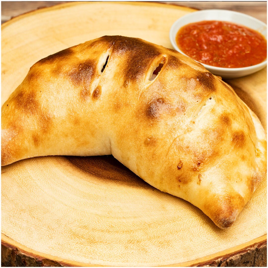 Order Cheese Calzone - Calzone food online from Papazzi Pizzeria store, Bellevue on bringmethat.com