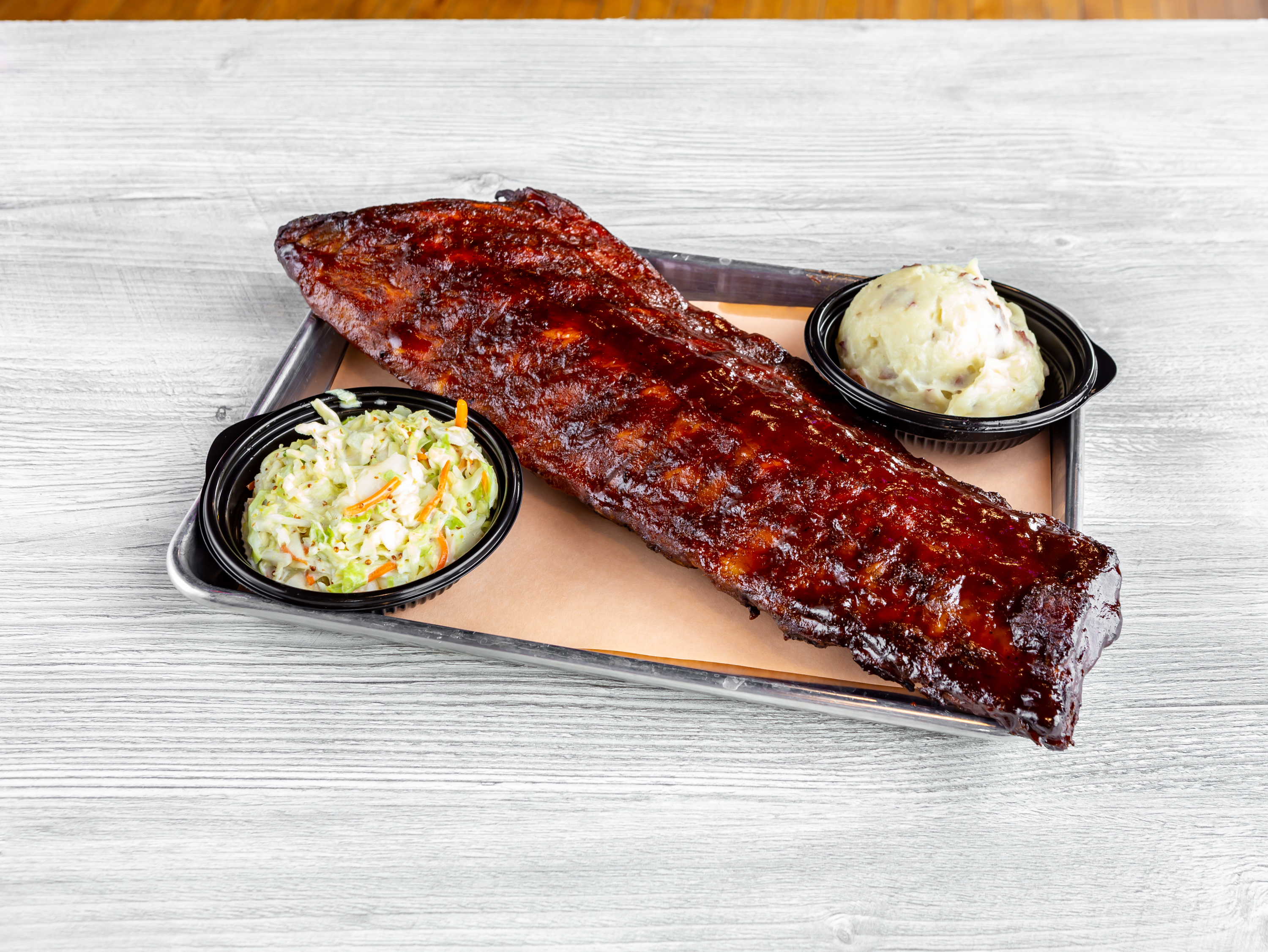 Order Chicago’s Baby Back Ribs food online from Bbqd Productions Bar & Grill store, Lake Zurich on bringmethat.com