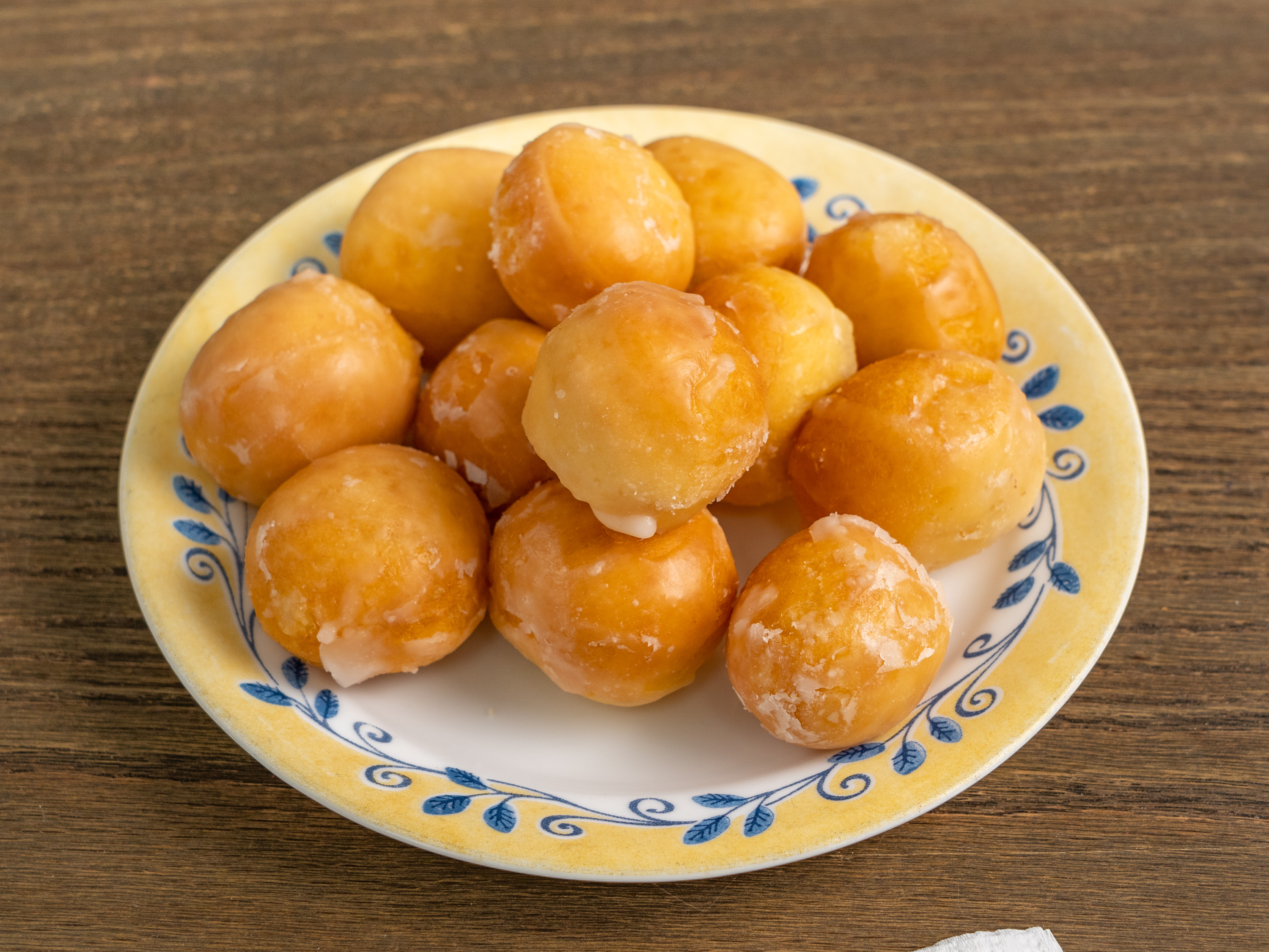 Order Glazed Donut Holes food online from Snowflake Donuts store, Boerne on bringmethat.com