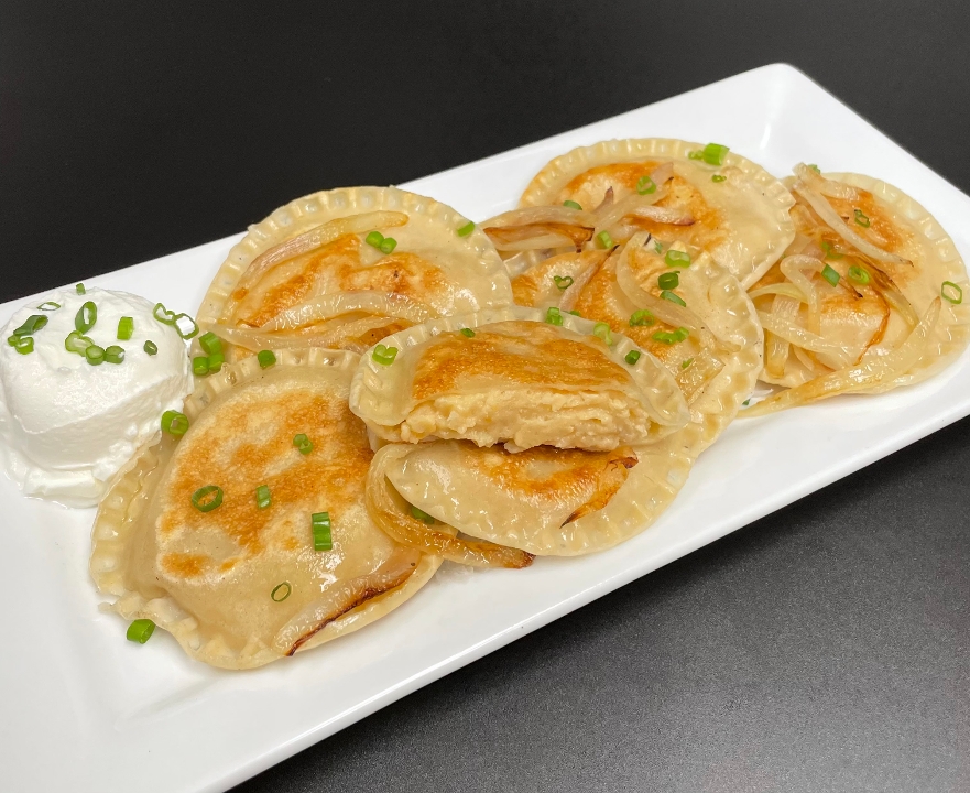 Order Sautéed Jumbo Scratchmade Crab Pierogies food online from Captain’s Curbside Seafood store, Trappe on bringmethat.com