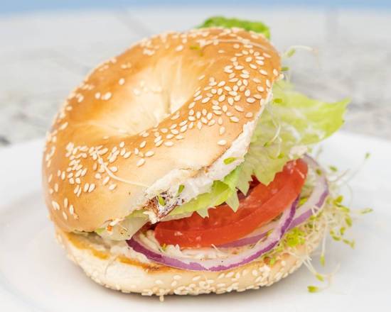 Order Sun-Dried Tomato Veggie Bagel food online from Java Beach Cafe store, San Francisco on bringmethat.com