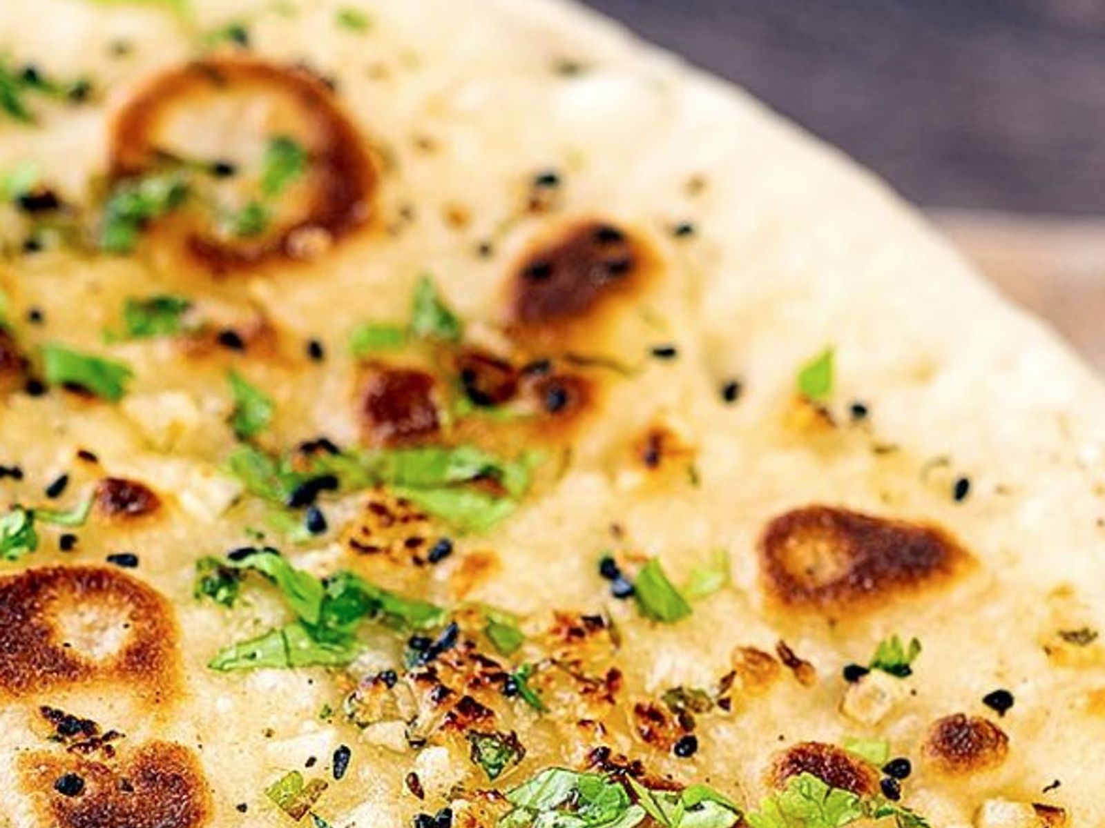 Order Garlic Naan food online from Curry Home store, Pittsburgh on bringmethat.com