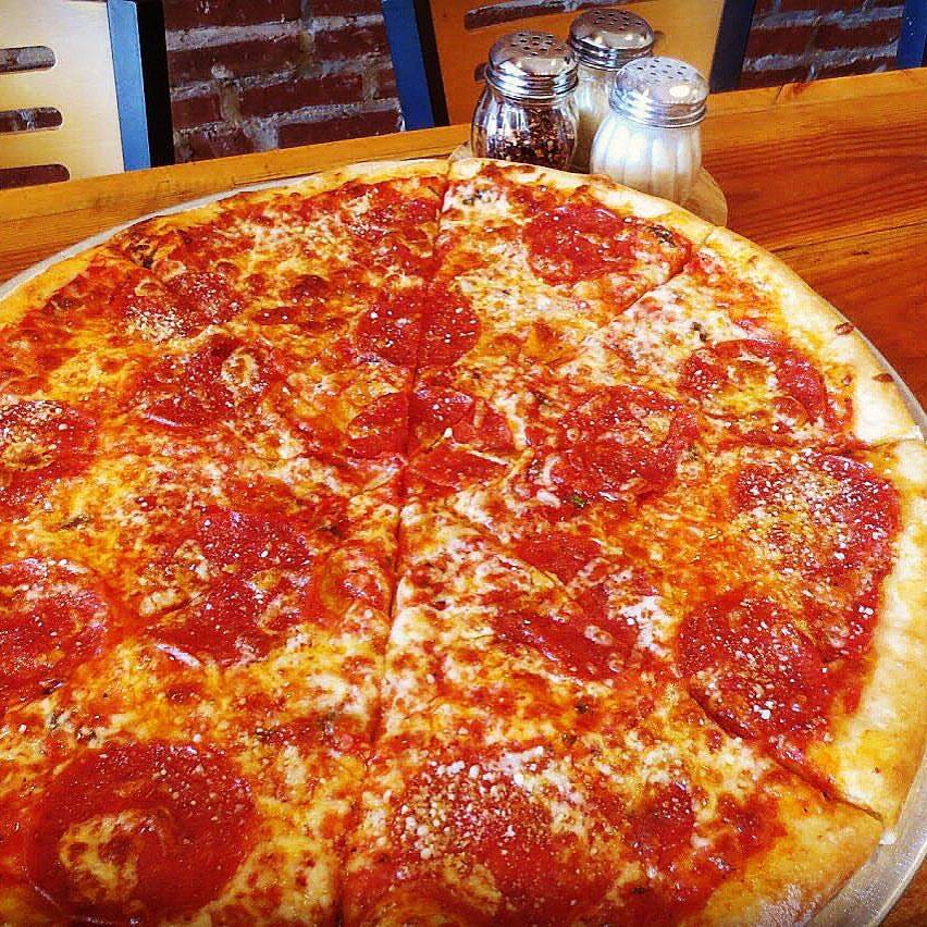 Order Individual with 1 Topping Pizza food online from Crust Pizza store, Bryn Mawr on bringmethat.com