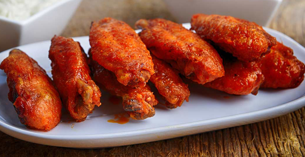 Order 10 Piece Wings food online from Pizza Azteca store, Dallas on bringmethat.com