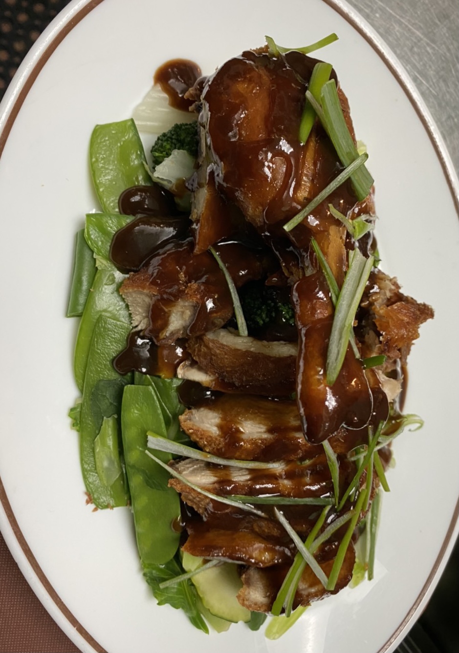 Order Duck with Tamarind Sauce food online from Prik Thai Kitchen store, Astoria on bringmethat.com