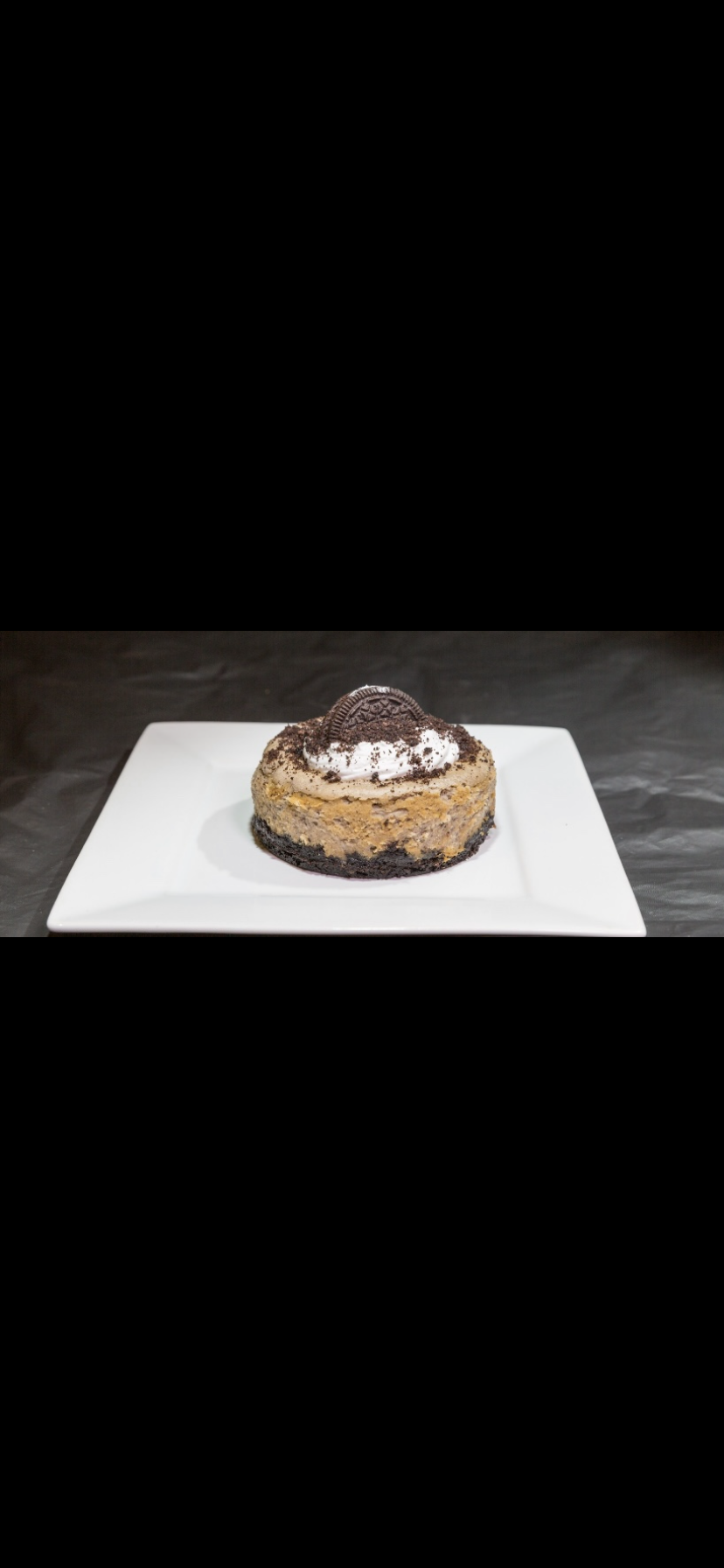 Order Oreo personal size cheesecake  food online from Virellas Sweets store, Easton on bringmethat.com
