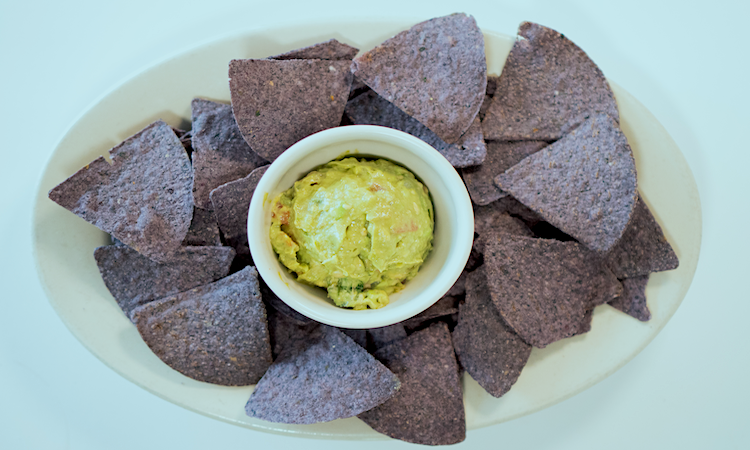 Order Guacamole ＆ Tortilla Chips food online from A Moveable Feast Cafe And Health Food Store store, Houston on bringmethat.com