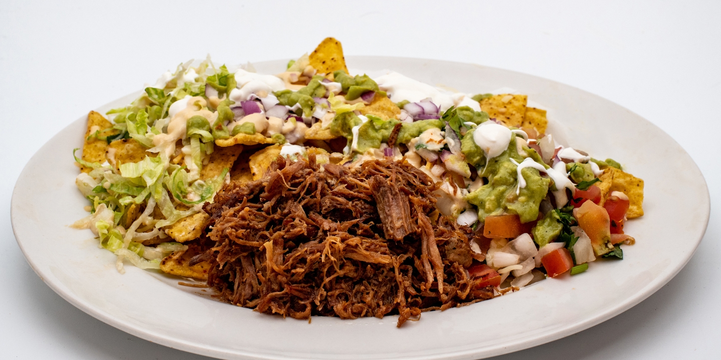 Order Spicy Beef Nachos food online from Amelia's Taqueria store, Allston on bringmethat.com