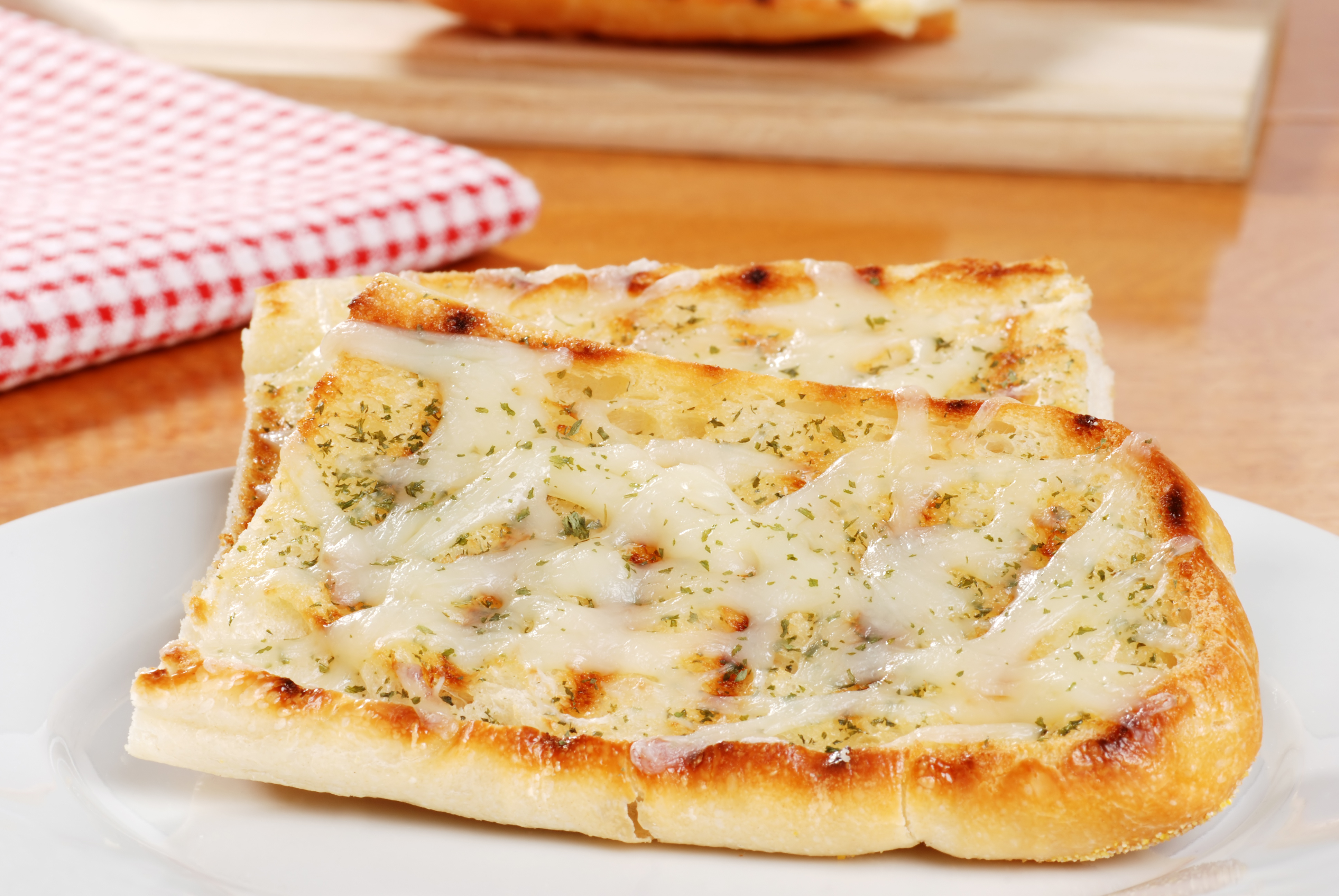 Order Garlic Bread with Cheese food online from Primo Pizzeria store, Ballston Spa on bringmethat.com
