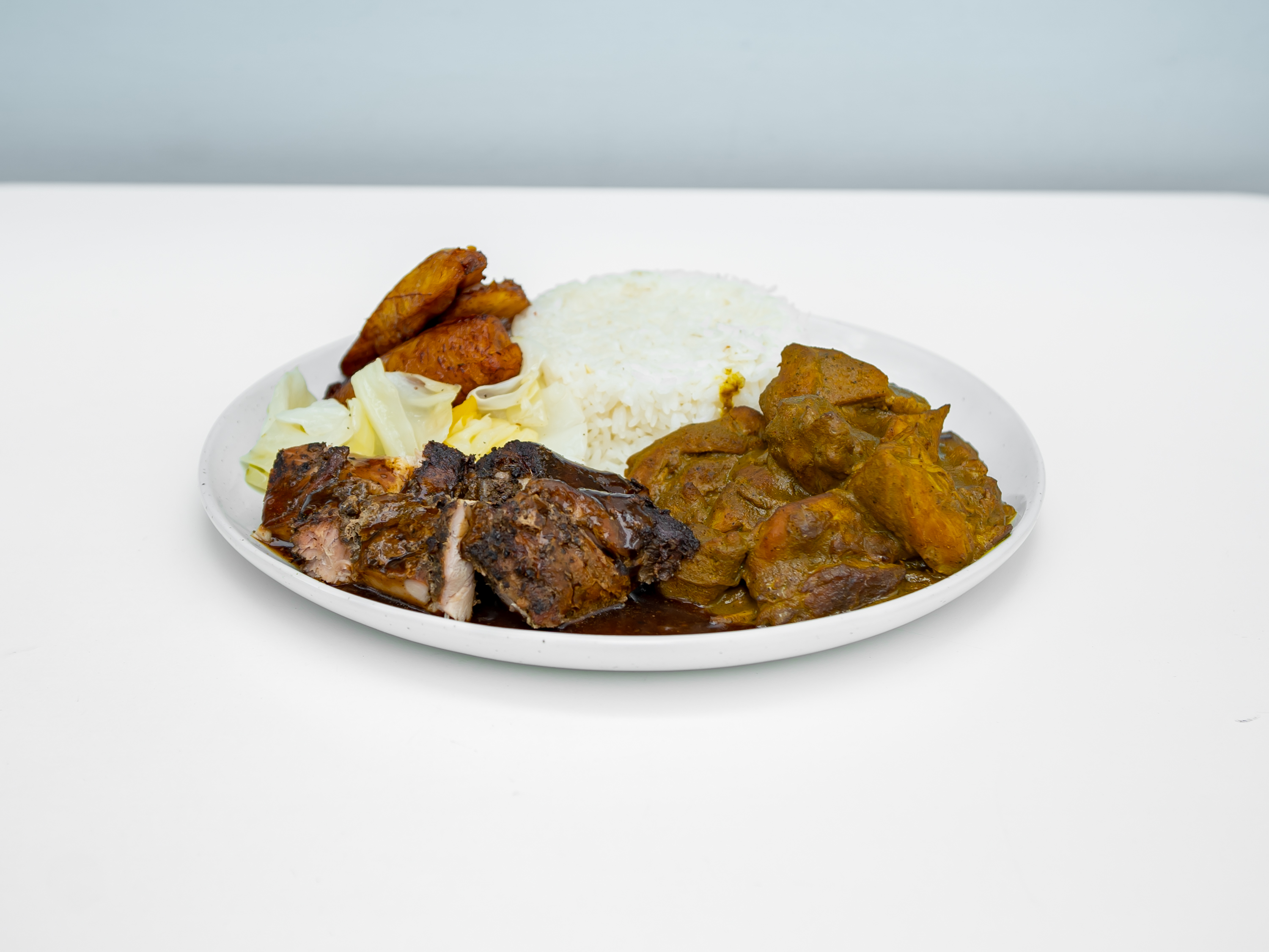 Order Jerk & Curry Chicken Plate  food online from ABeautifulLife Bakery Cafe store, Los Angeles on bringmethat.com