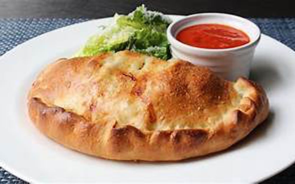 Order Calzone - Small food online from Pino's Pizzeria store, Easton on bringmethat.com