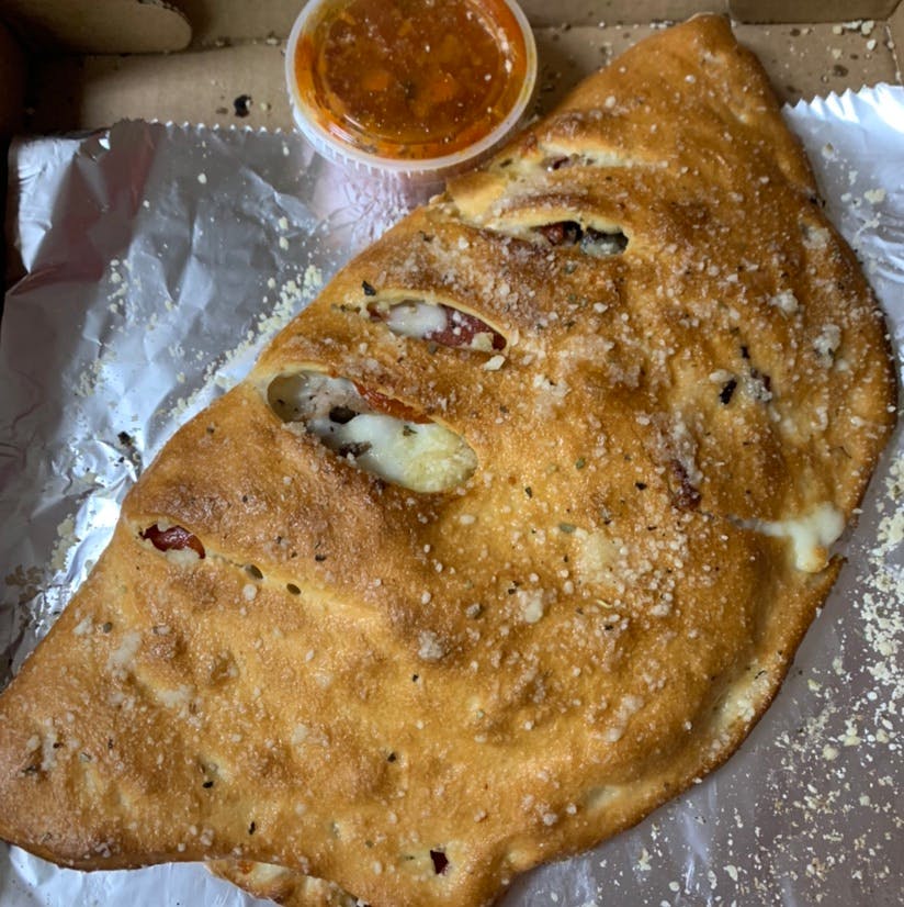 Order Meat Lover's Calzone - Small food online from Sals Pizza store, Suffolk on bringmethat.com
