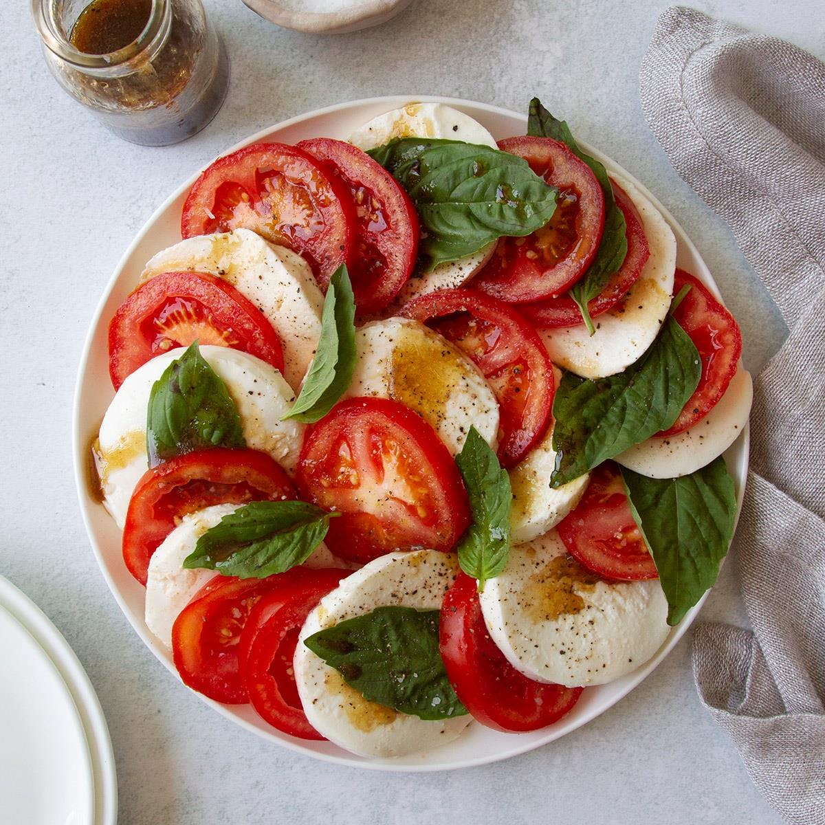 Order Caprese Salad - Salad food online from Mimo's New York Style Pizzeria store, New Albany on bringmethat.com