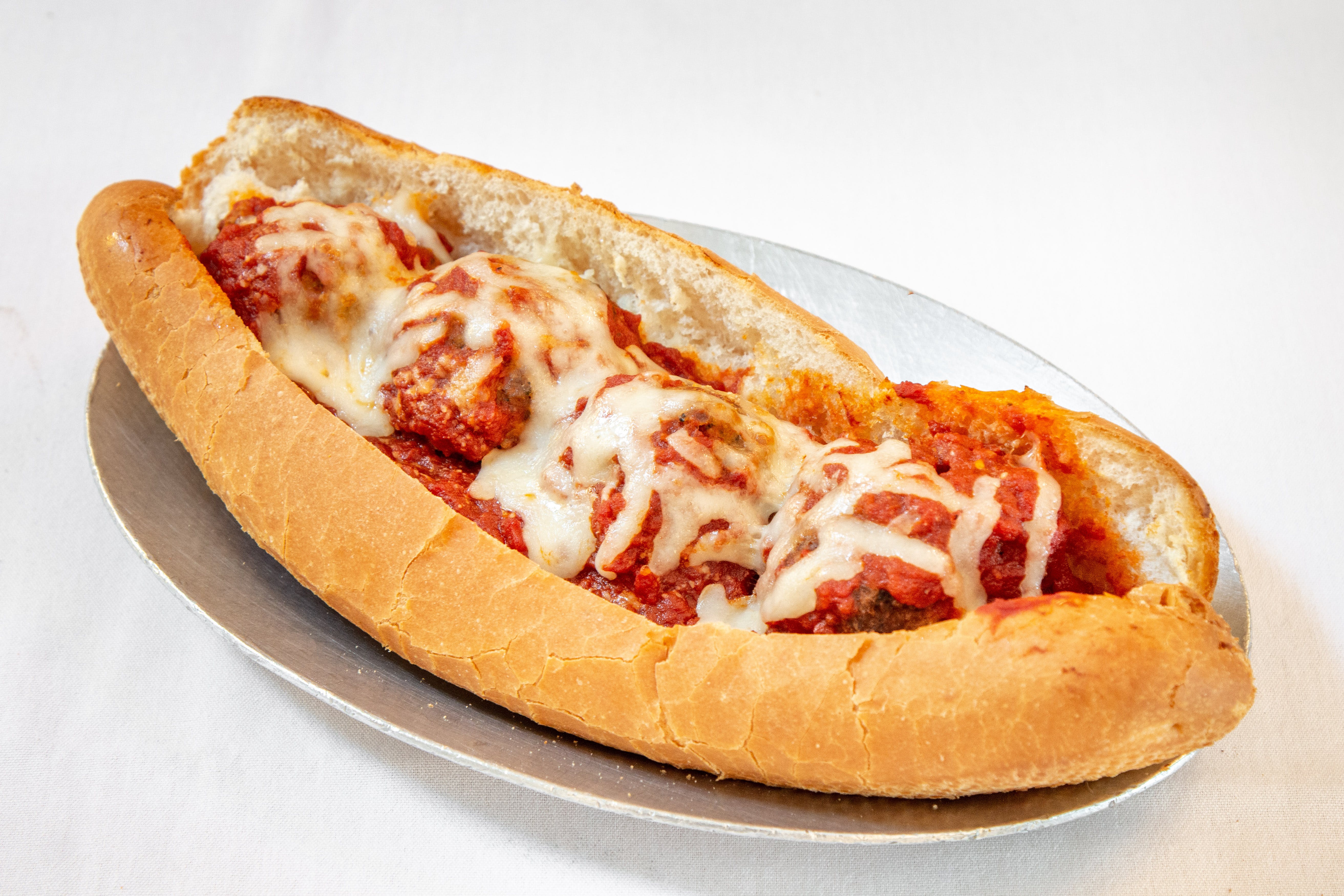Order Meatball Sandwich - 9" food online from Milano Pizza store, Frankston on bringmethat.com