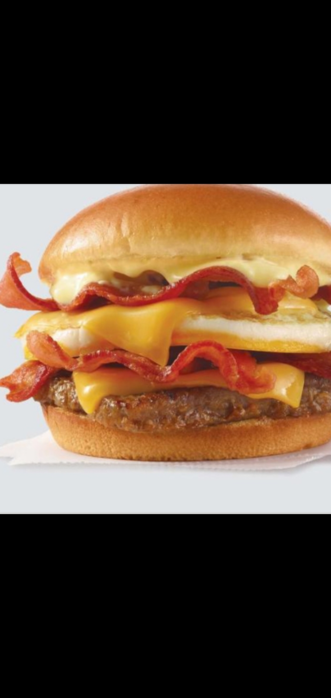 Order Breakfast Baconator Sandwich (Eggs double Bacon & Sausage patty with Cheese) food online from American Gourmet Foods Deli store, New York on bringmethat.com