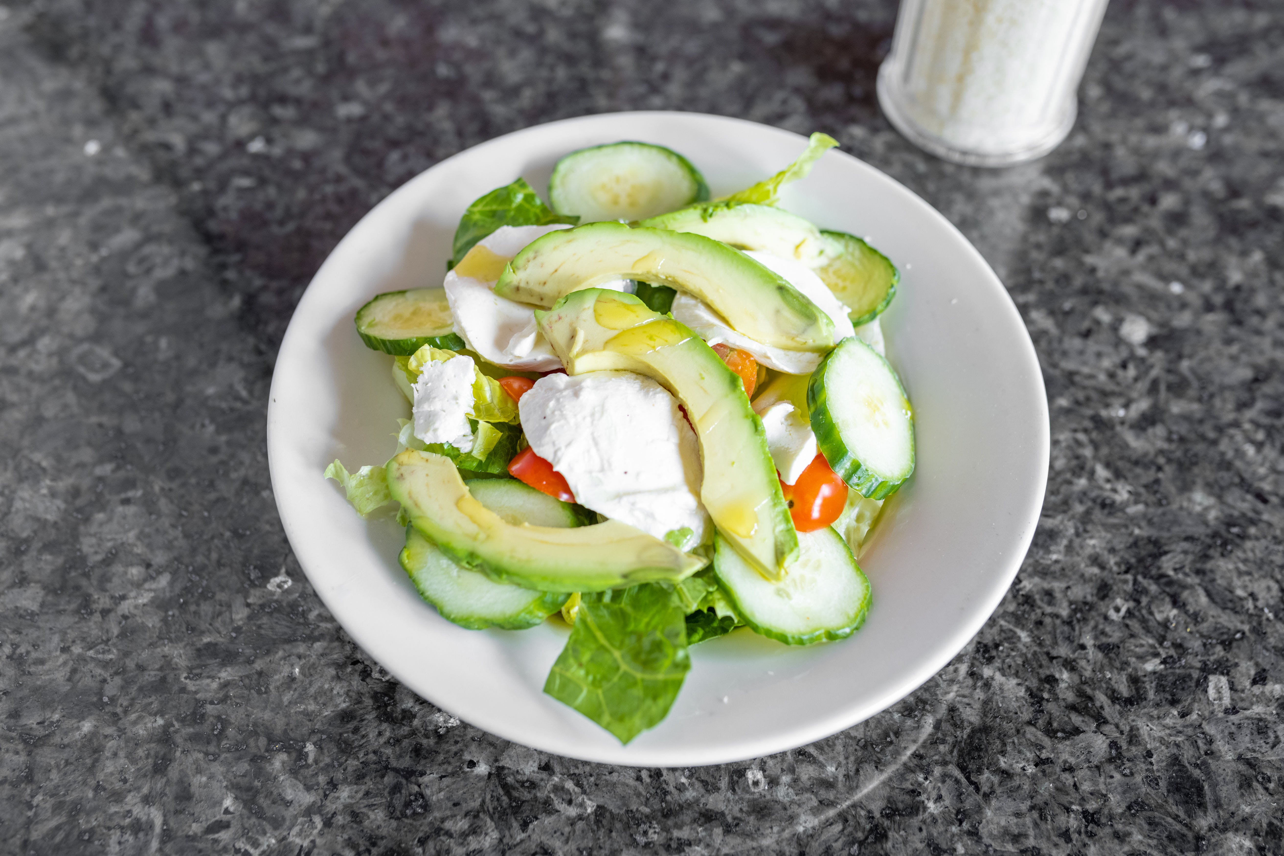 Order Tomato Avocado Salad - Individual food online from John's Of Arthur Ave Restaurant store, Middletown on bringmethat.com