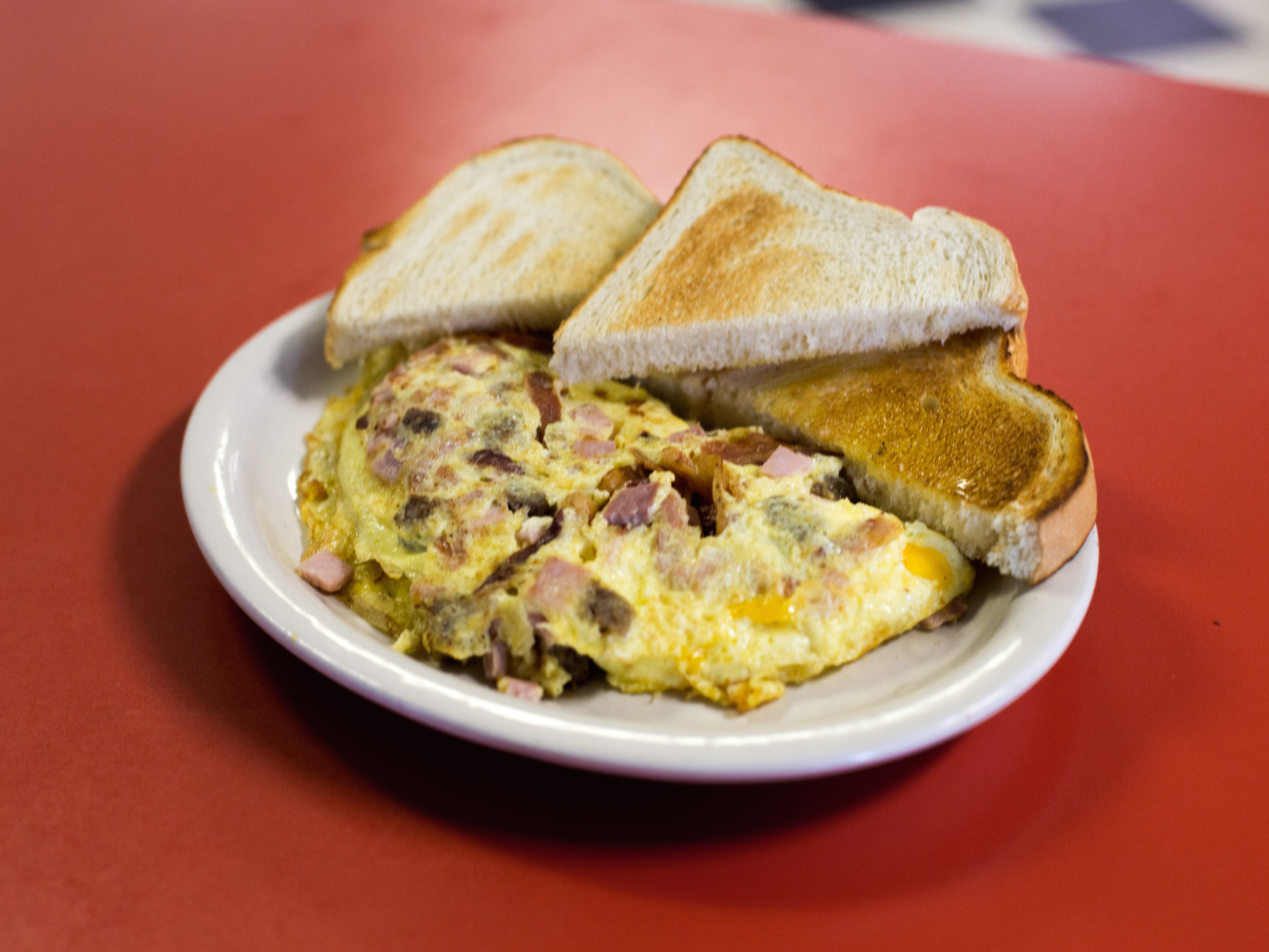 Order Meat Lovers Omelet food online from Nina Cafe store, Kalamazoo on bringmethat.com