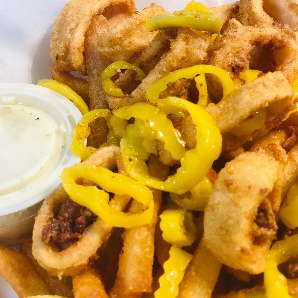 Order Fried Calamari - Entree food online from Milanos Pizza store, Providence on bringmethat.com