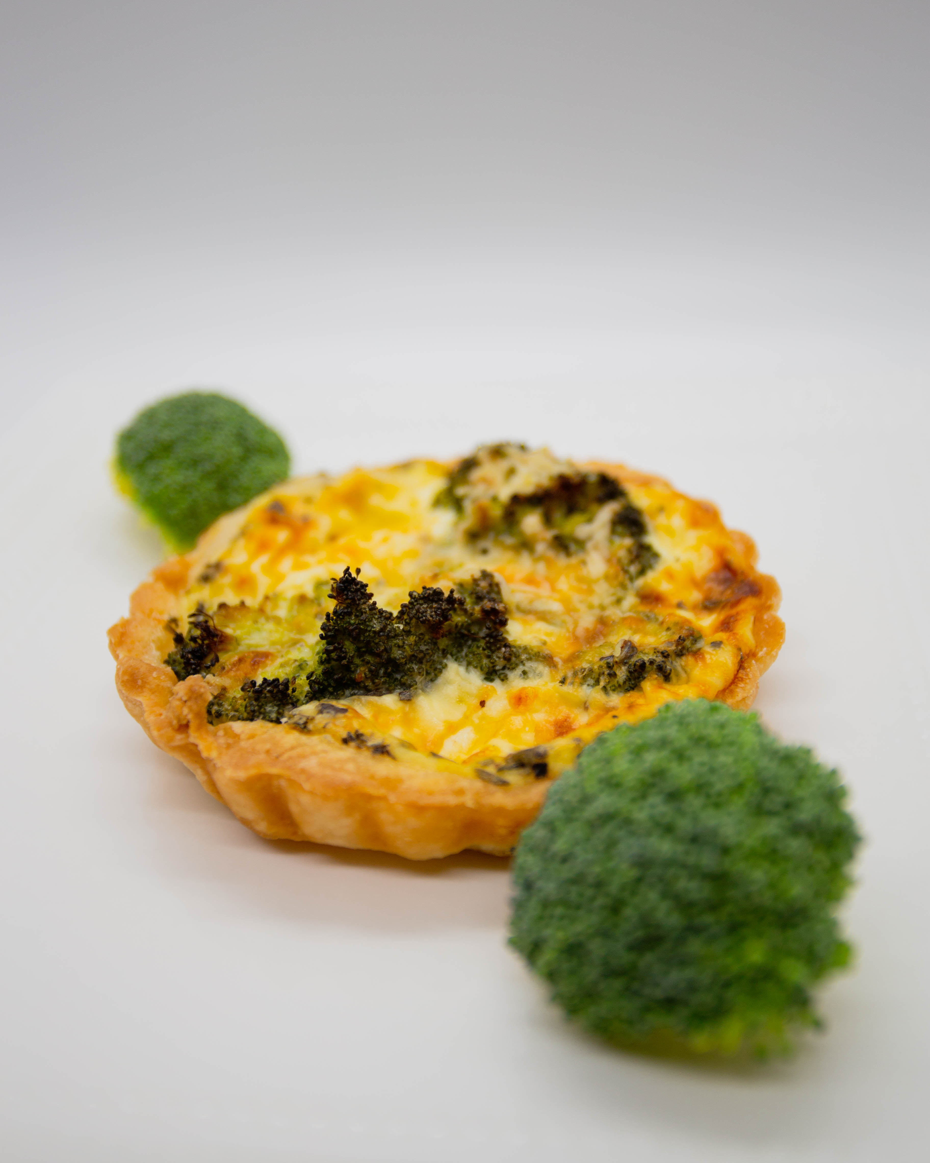 Order 4" Round Broccoli Quiche food online from Chouchou store, Los Angeles on bringmethat.com