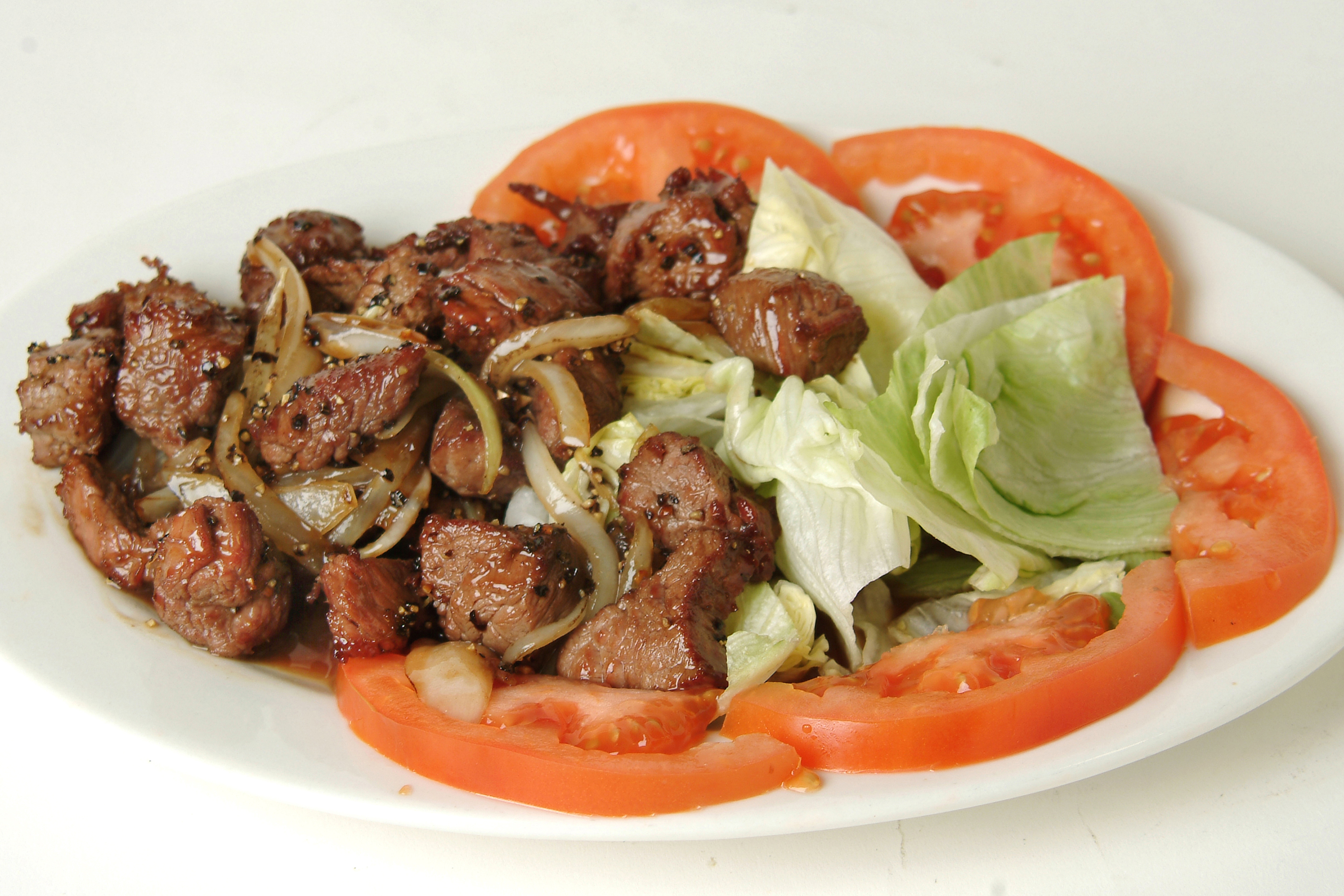 Order Beef Luc Lac food online from Lotus Garden Restaurant store, San Diego on bringmethat.com