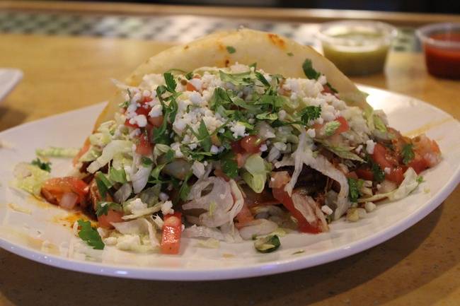 Order Puffy Taco food online from Cuco Taqueria store, Columbus on bringmethat.com