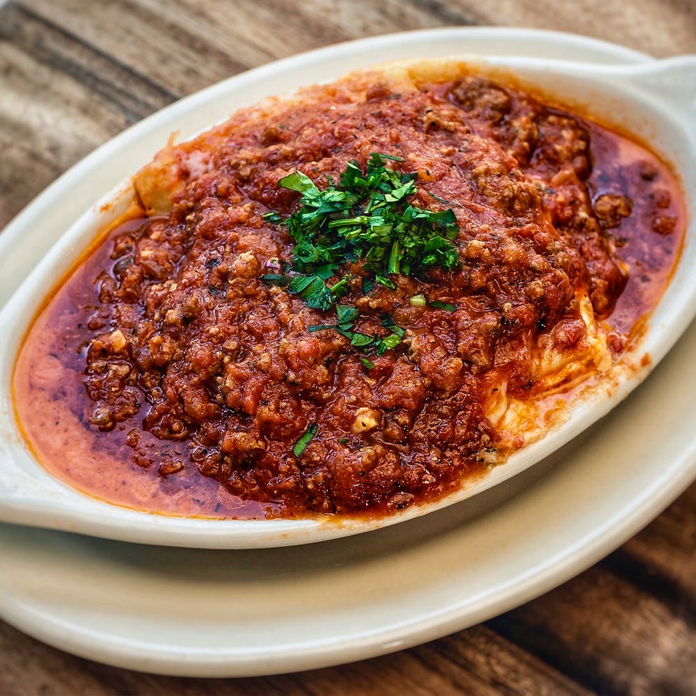 Order Four Cheese Lasagna with Meat Sauce - Small food online from Amici's East Coast Pizzeria store, Redwood Shores on bringmethat.com