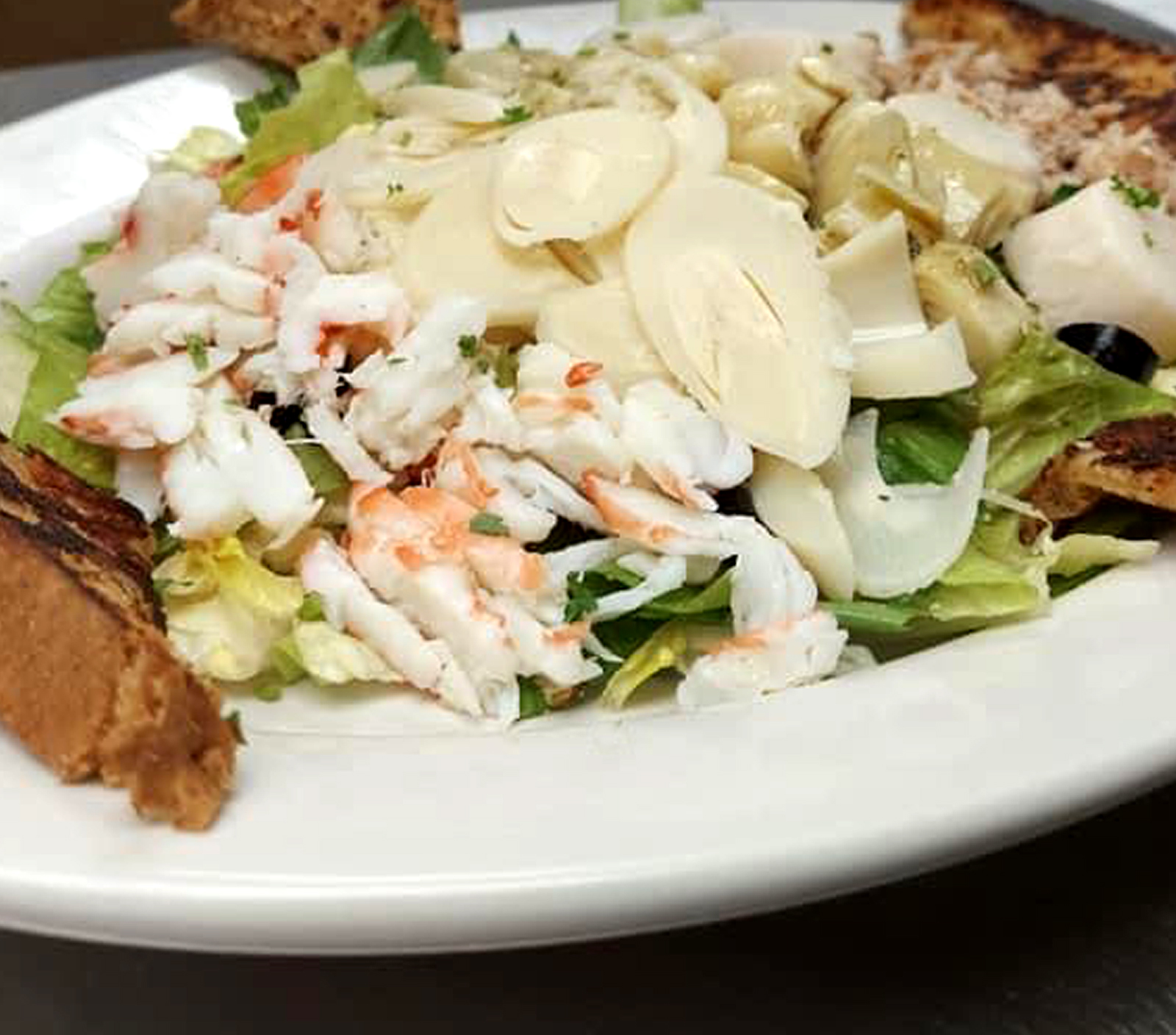 Order Seafood Salad "Monstro" food online from Pinocchio In The Desert store, Palm Springs on bringmethat.com