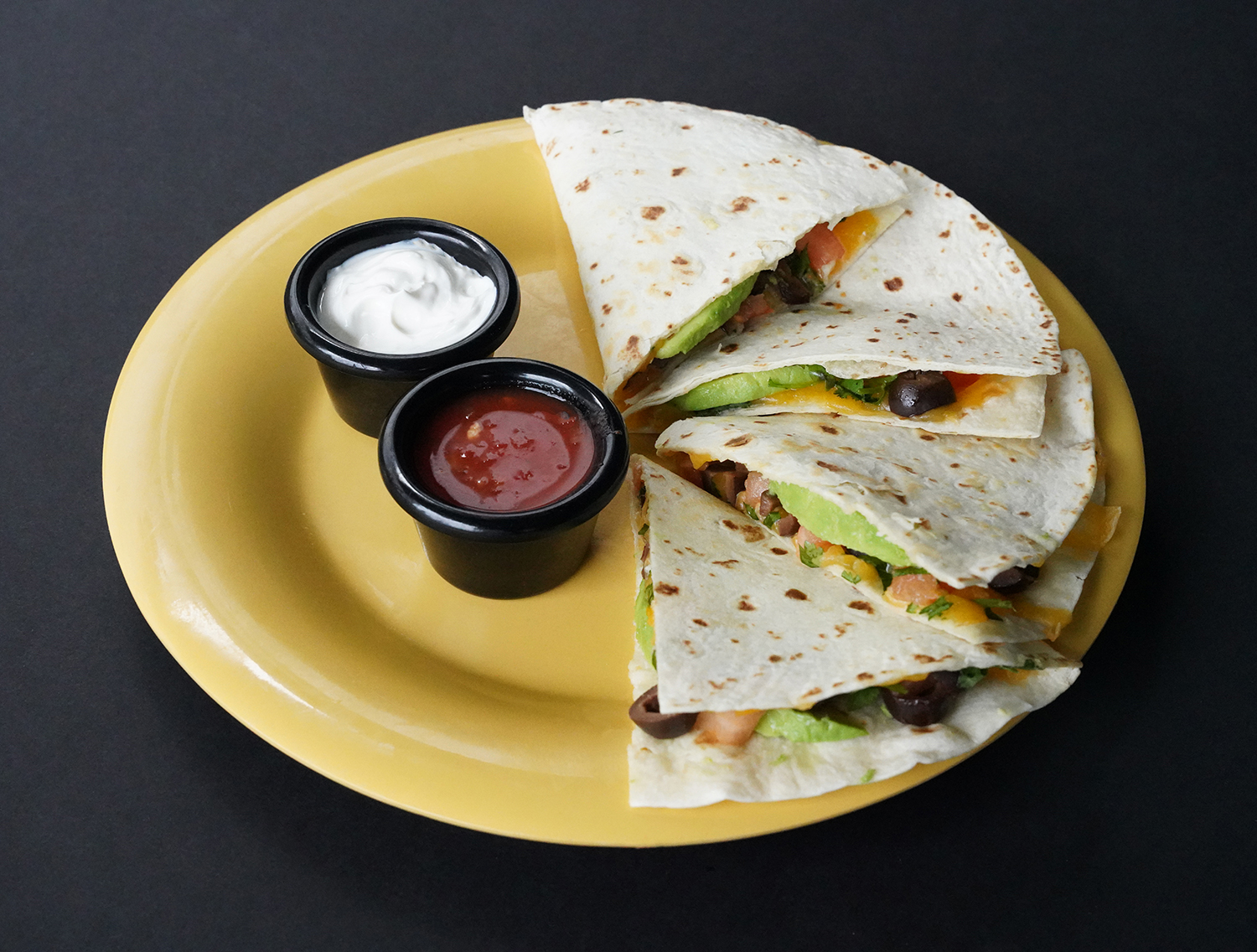 Order Deluxe Quesadilla food online from Cafe Yumm! store, Corvallis on bringmethat.com