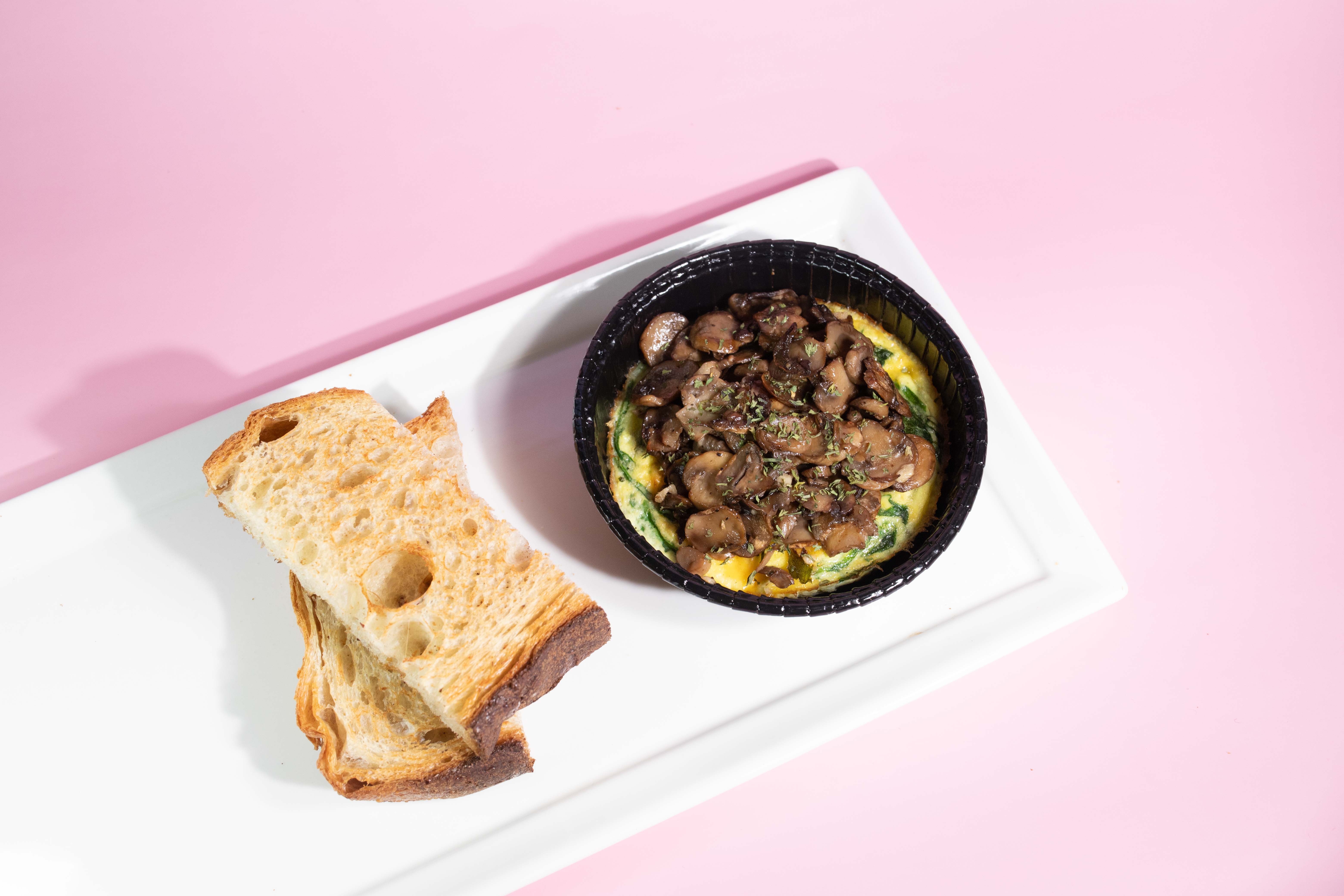 Order Mushroom + Spinach Frittata w/ Toast food online from Blk Dot Coffee store, Irvine on bringmethat.com