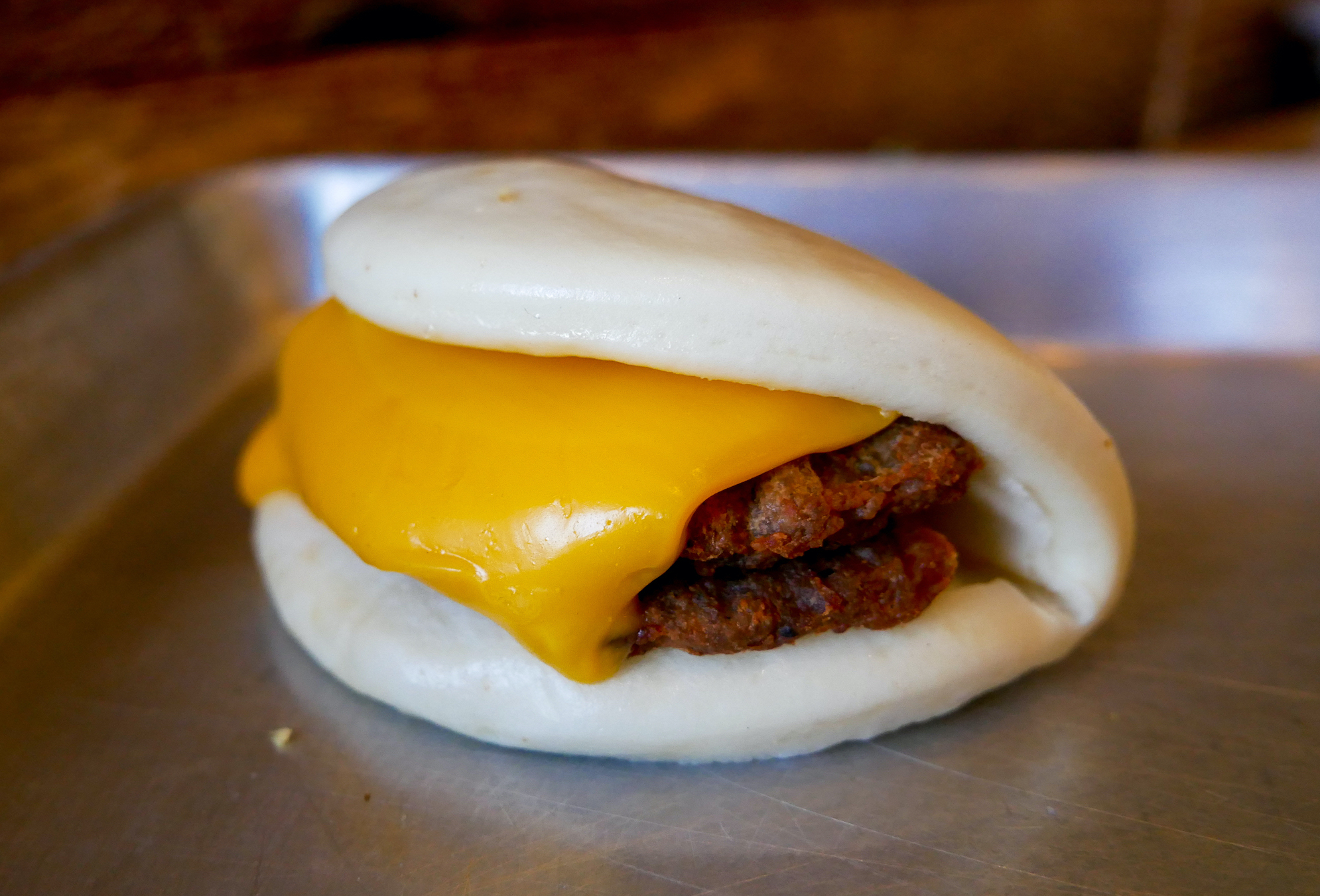 Order Sausage & Cheese Bao food online from Fat Bao-Upper Kirby store, Houston on bringmethat.com