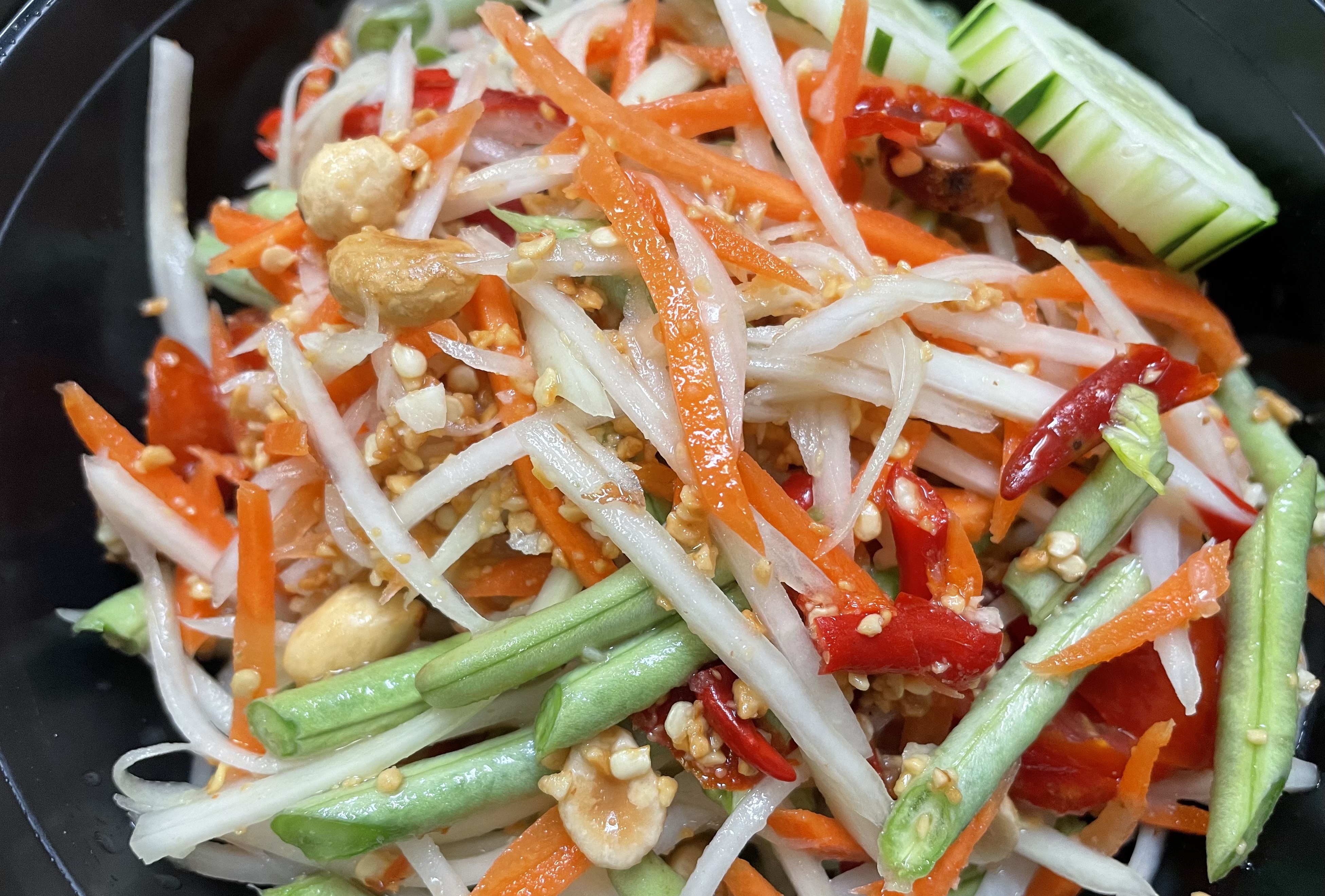Order Som Tom Green Papaya Salad food online from Yummy Thai store, Buffalo on bringmethat.com