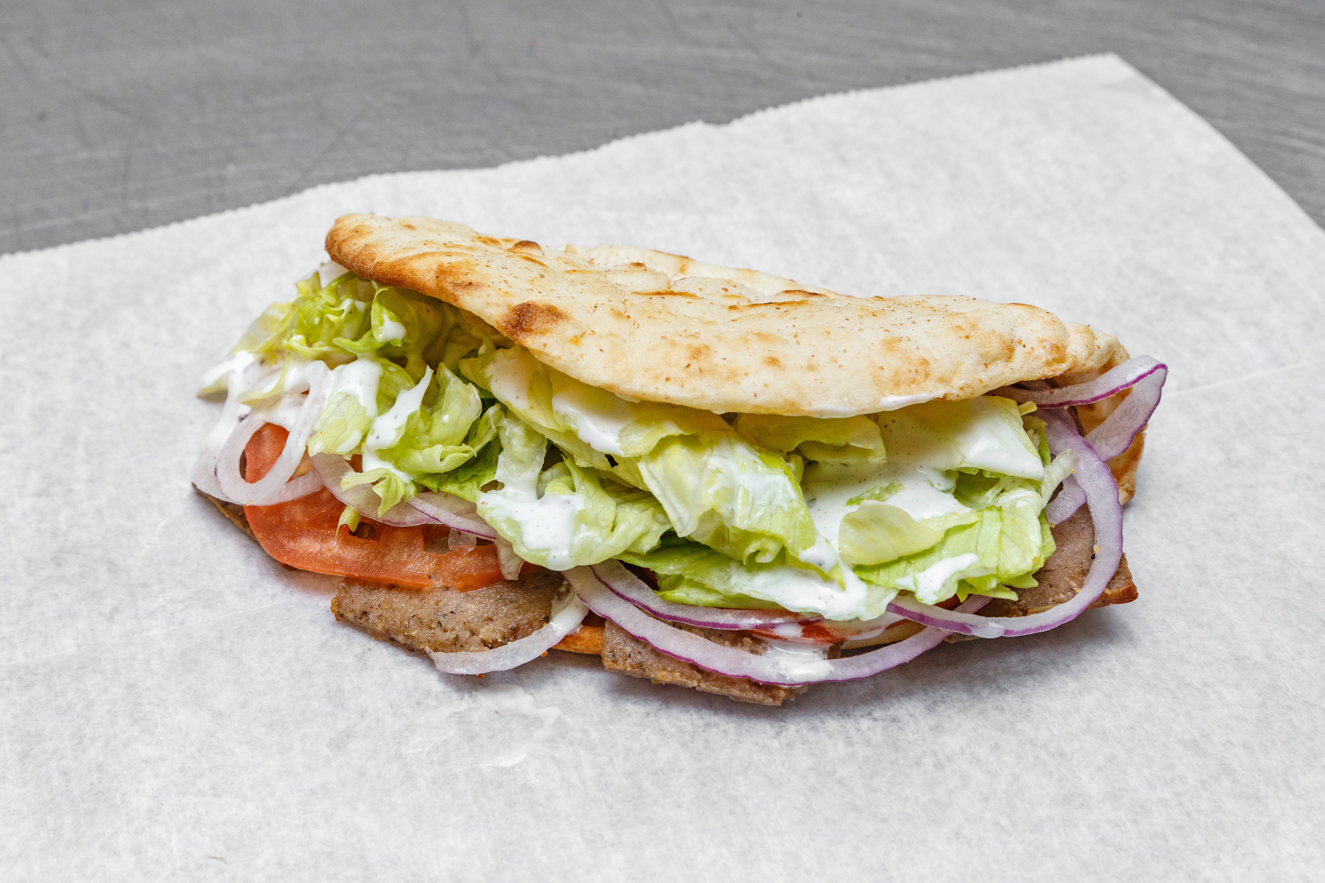 Order Gyro - Gyro food online from Pizza DeCasa store, Coraopolis on bringmethat.com