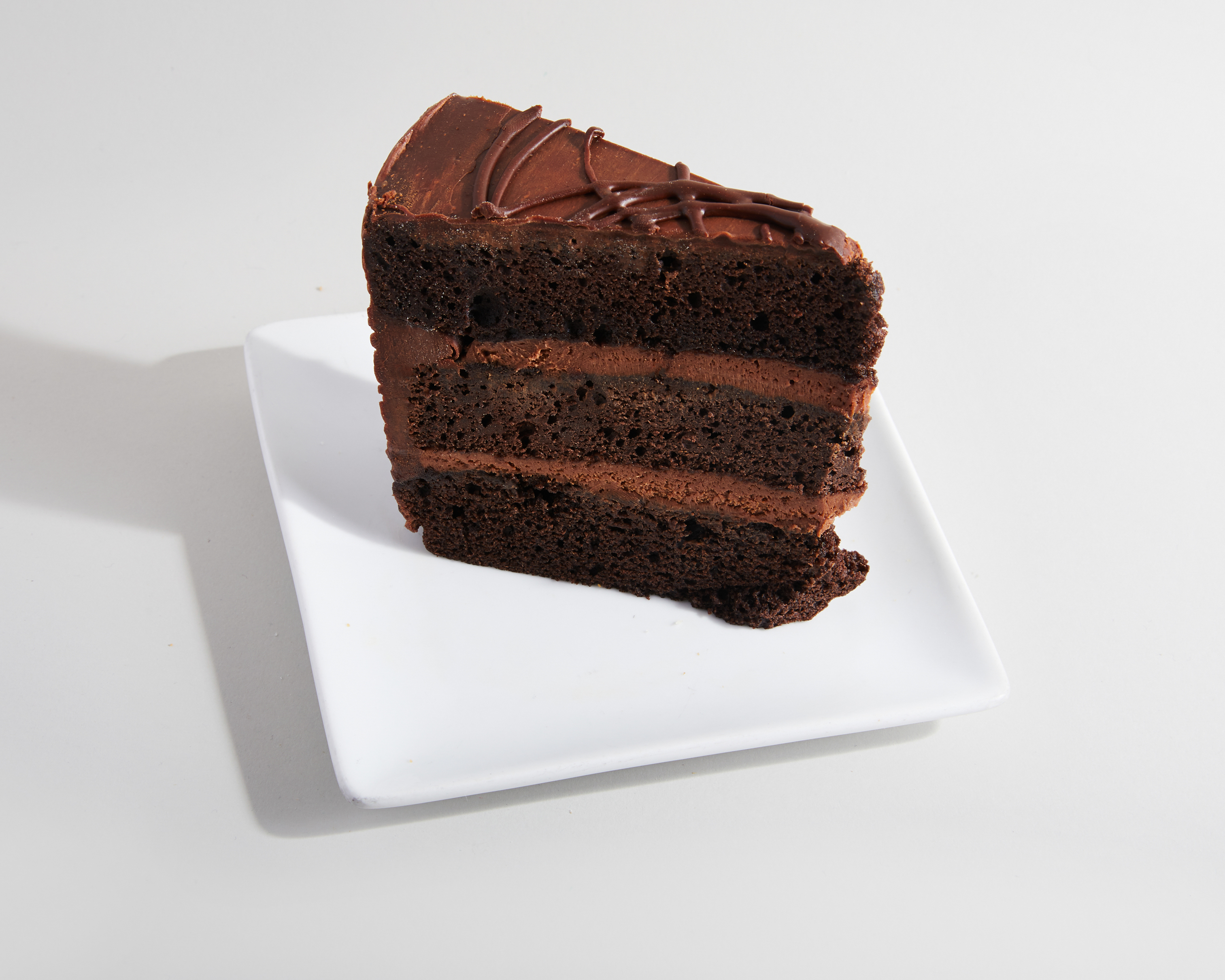 Order OMG! Chocolate Cake (Slice) food online from Sweetwaters store, Newark on bringmethat.com