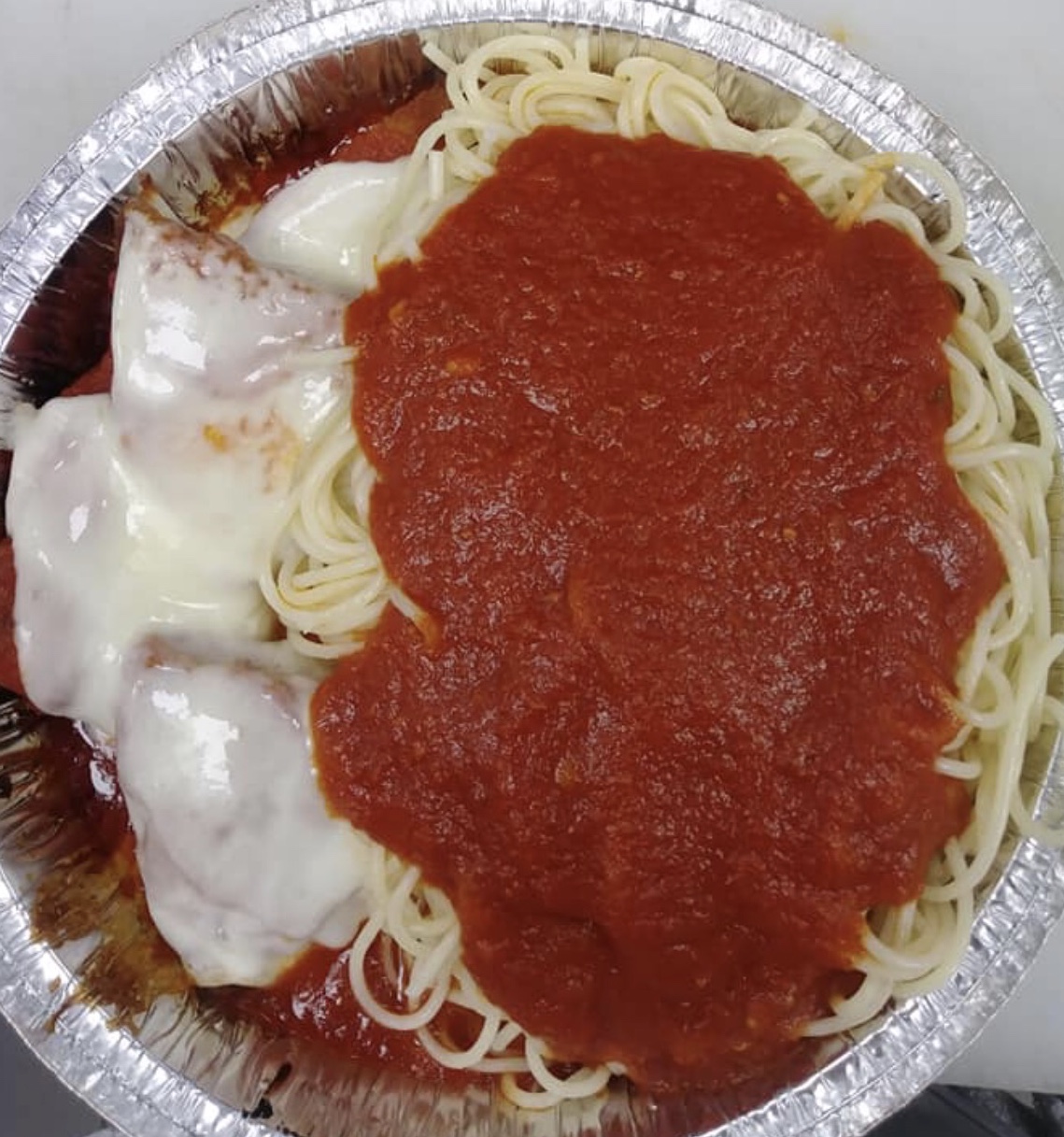 Order Chicken Parmigiana with Pasta food online from Linwood Pizza store, Fort Lee on bringmethat.com