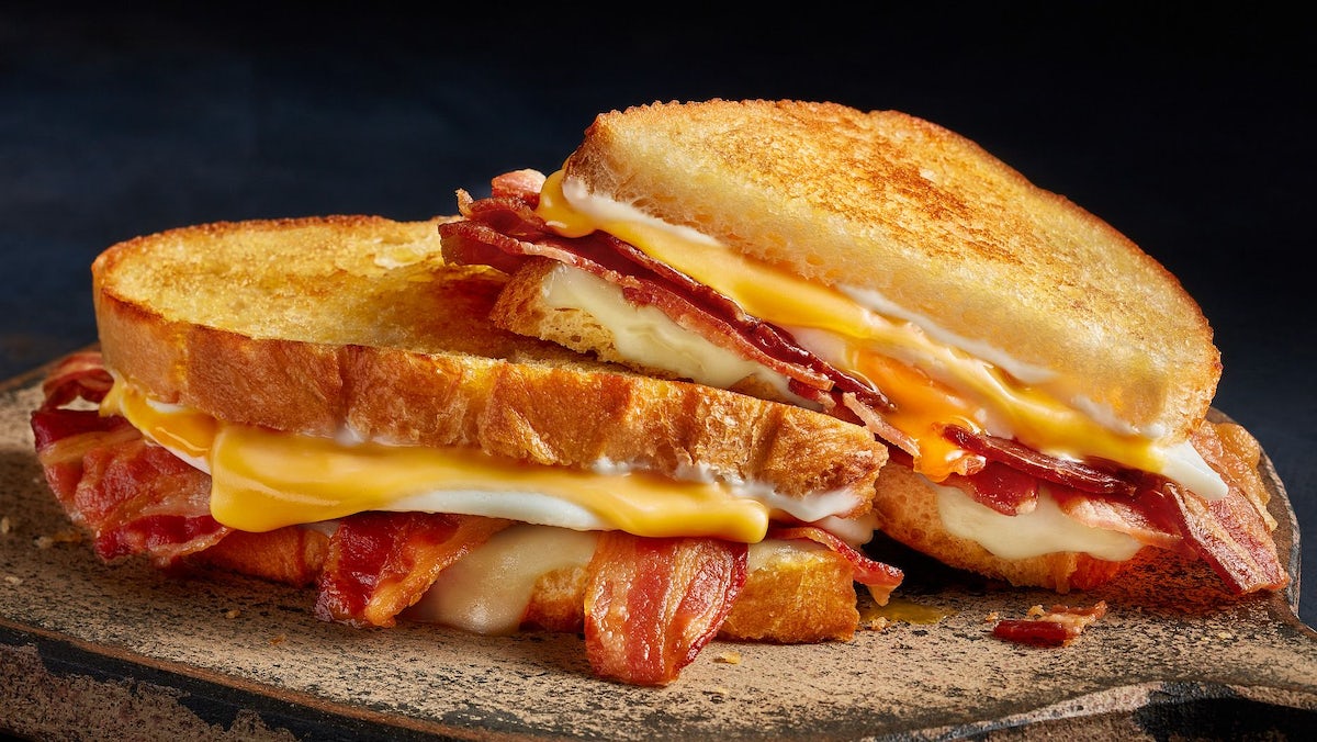 Order Breakfast N' Bread Melt food online from The Burger Den store, Schertz on bringmethat.com