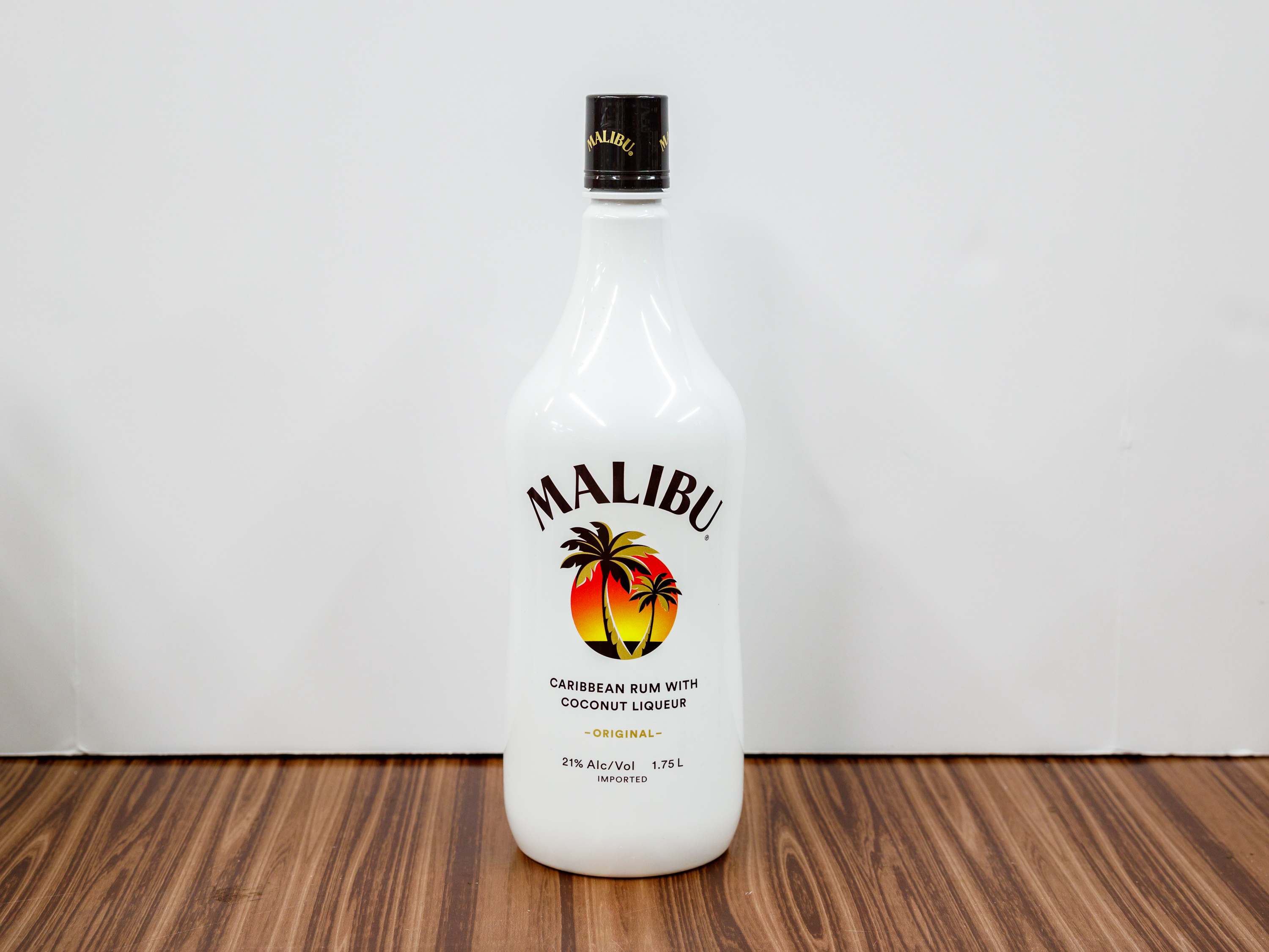 Order Malibu Rum 750ml food online from DAVE & MINA LIQUOR MART store, Santa Ana on bringmethat.com