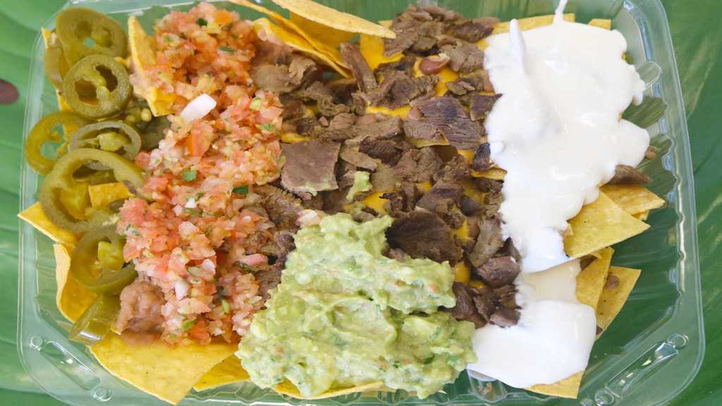 Order Super Nachos food online from Tacos A La Parrilla store, San Jose on bringmethat.com