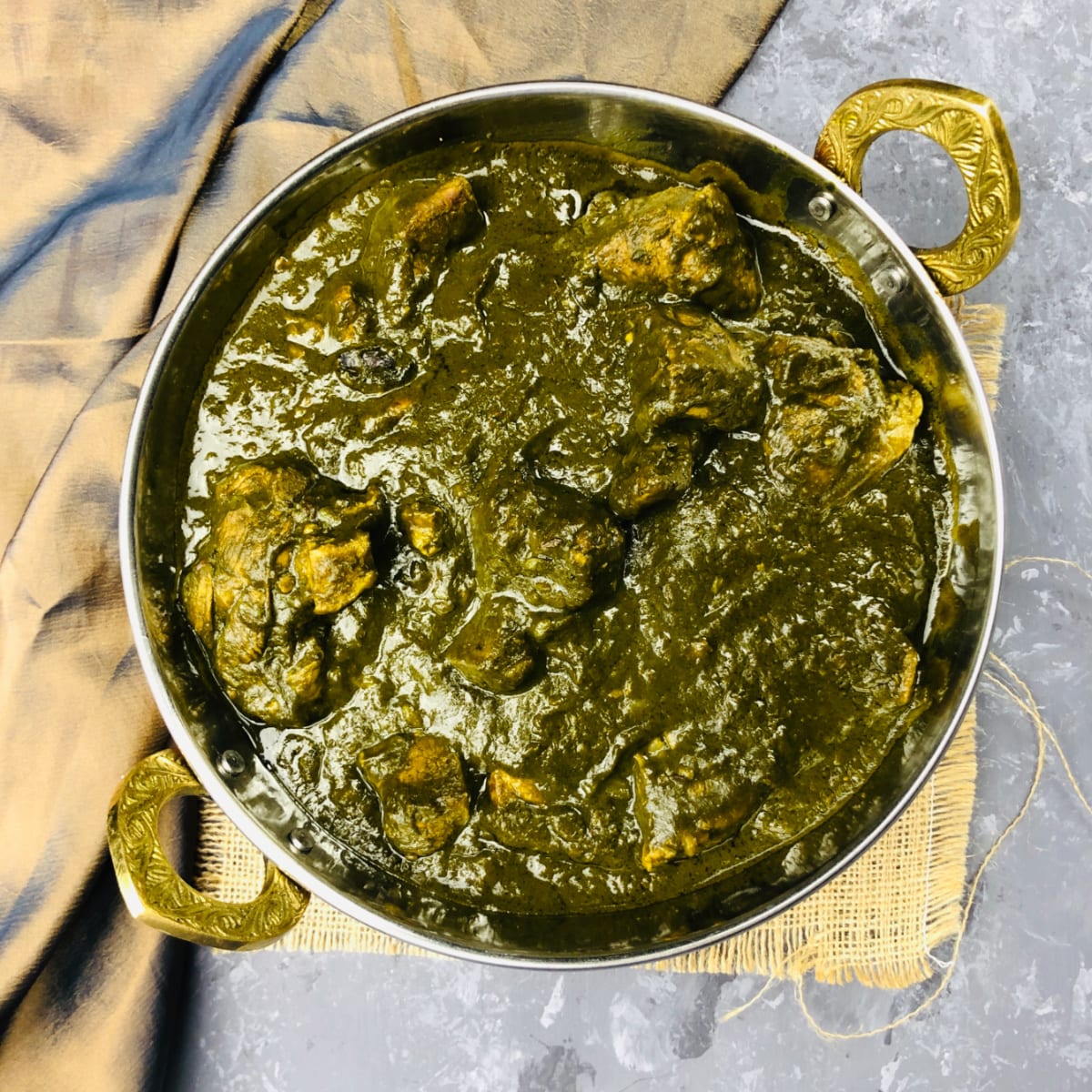 Order Goat Saag food online from Chaska Fine Indian Cuisine store, Jersey City on bringmethat.com
