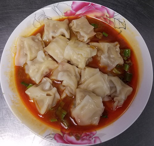Order 19. Meat Dumpling in Spicy Sauce food online from Szechuan House store, Ames on bringmethat.com