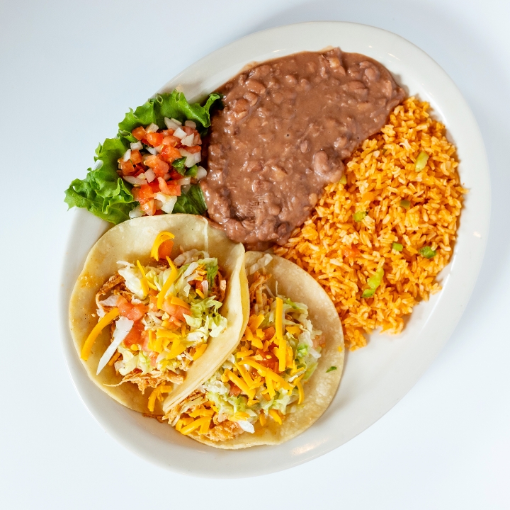 Order Two Classic Seasoned Chicken Tacos food online from El Fenix Mexican Restaurant store, Greenville on bringmethat.com