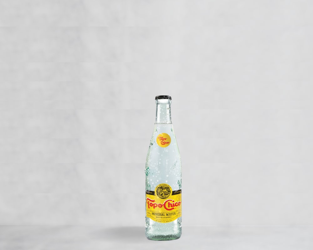 Order Topo Chico - Sparkling food online from Veggie Grill store, Portland on bringmethat.com
