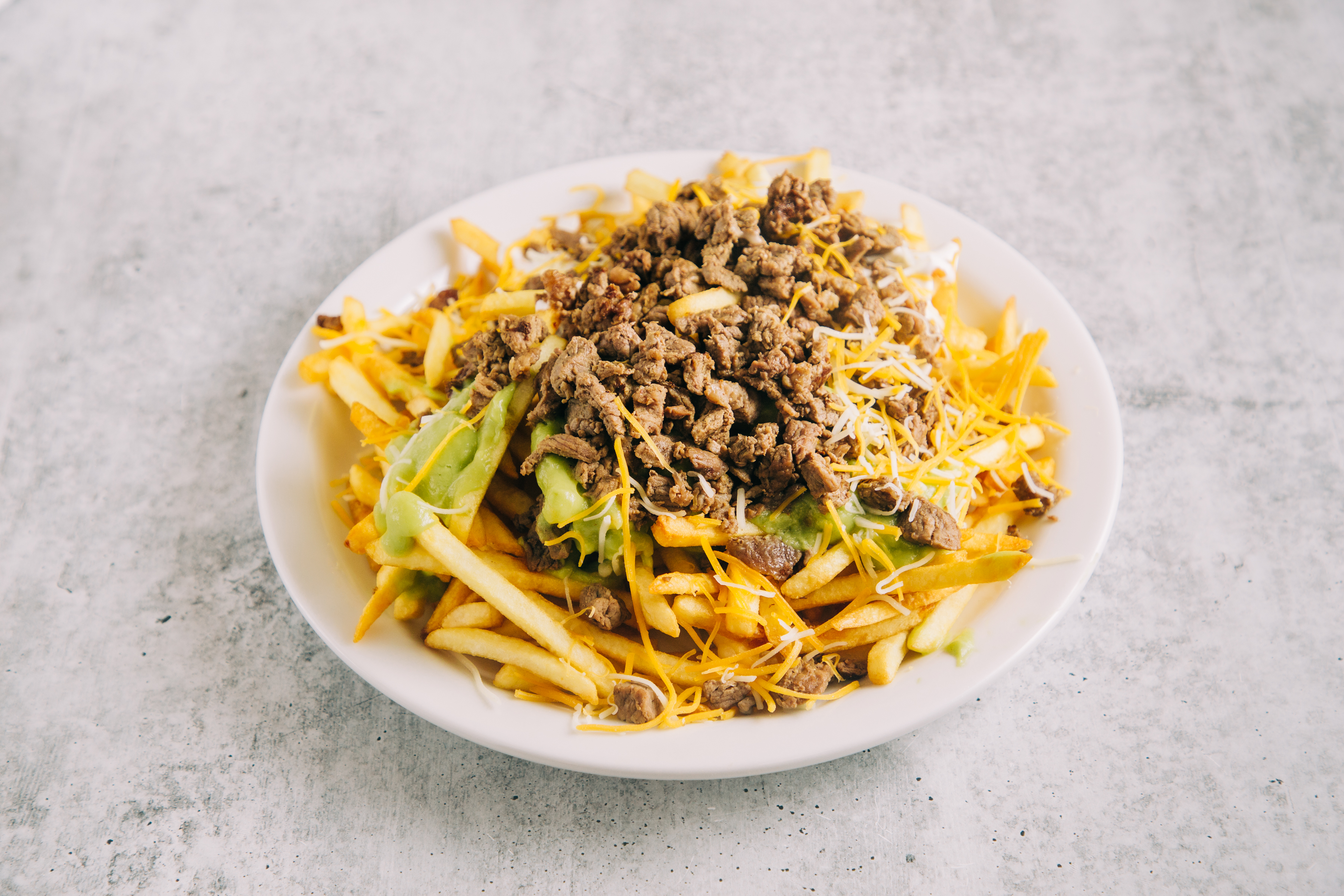 Order Carne Asada Fries food online from Betos Mexican Food store, West Valley City on bringmethat.com