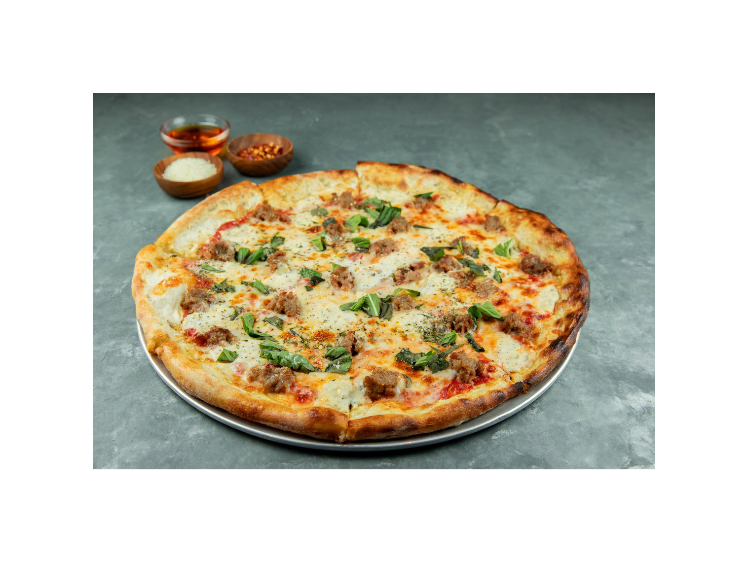 Order TRE PORCELLINI (THREE MEATS PIZZA) 10" food online from Patxi's Chicago Pizza store, San Francisco on bringmethat.com